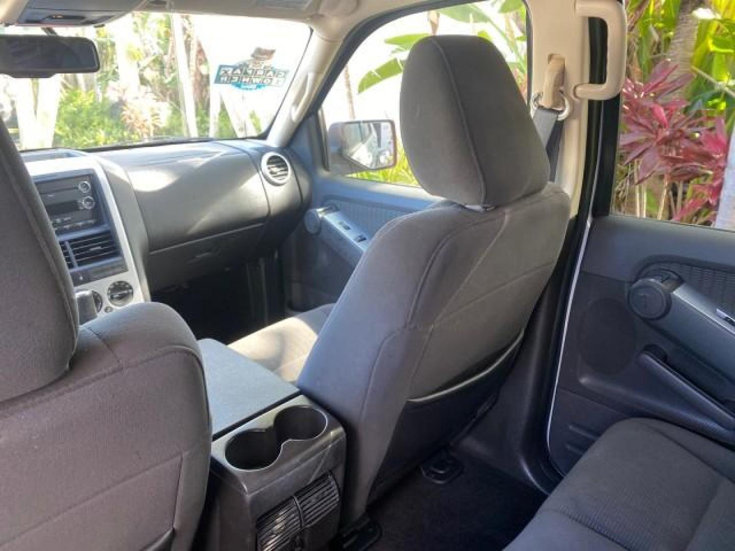 2010 Brilliant Silver Metallic /Charcoal Black Mercury Mountaineer 1 OWNER LOW MILES 78,753 (4M2EN3HE6AU) with an 4.0L SOHC 12-Valve V6 Engine engine, Automatic transmission, located at 4701 North Dixie Hwy, Pompano Beach, FL, 33064, (954) 422-2889, 26.240938, -80.123474 - OUR WEBPAGE FLORIDACARS1.COM HAS OVER 100 PHOTOS AND FREE CARFAX LINK 2010 MERCURY MOUNTAINEER 1 OWNER FLORIDA VIN: 4M2EN3HE6AUJ00892 4 M 2 E N 3 H E 6 A U J 0 0 8 9 2 4 DOOR WAGON/SPORT UTILITY 4.0L V6 F SOHC 12V GASOLINE 20 MPG FRONT WHEEL DRIVE Features ABS Brakes Air Conditioning Alloy Wheels AM - Photo#84