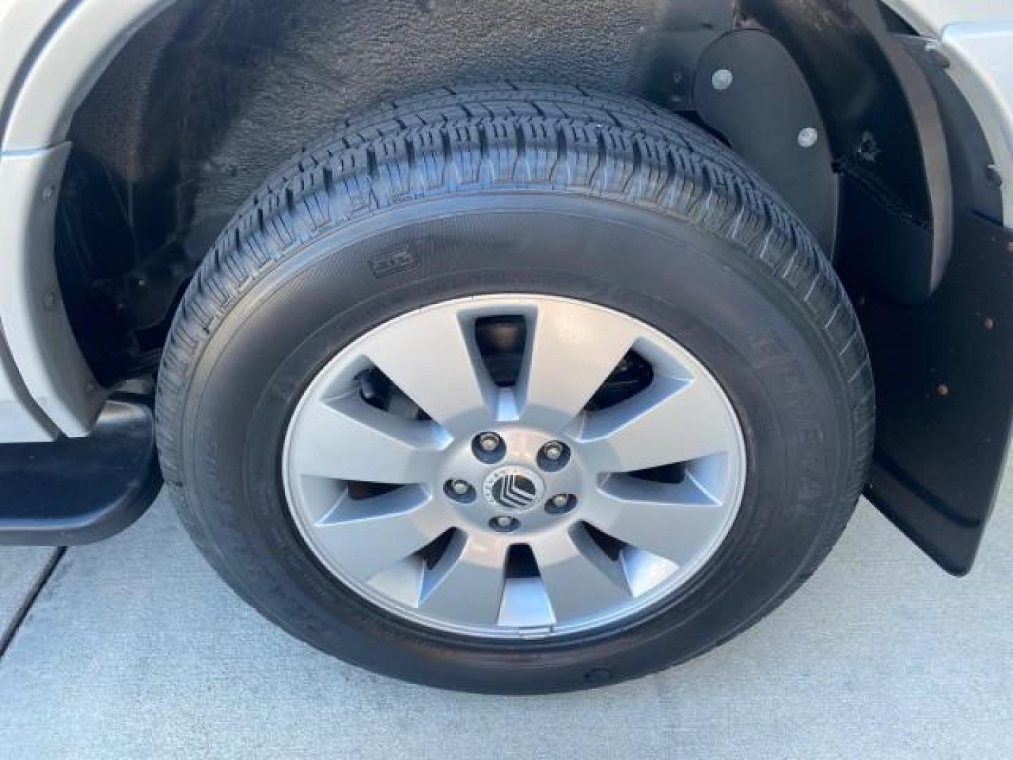 2010 Brilliant Silver Metallic /Charcoal Black Mercury Mountaineer 1 OWNER LOW MILES 78,753 (4M2EN3HE6AU) with an 4.0L SOHC 12-Valve V6 Engine engine, Automatic transmission, located at 4701 North Dixie Hwy, Pompano Beach, FL, 33064, (954) 422-2889, 26.240938, -80.123474 - OUR WEBPAGE FLORIDACARS1.COM HAS OVER 100 PHOTOS AND FREE CARFAX LINK 2010 MERCURY MOUNTAINEER 1 OWNER FLORIDA VIN: 4M2EN3HE6AUJ00892 4 M 2 E N 3 H E 6 A U J 0 0 8 9 2 4 DOOR WAGON/SPORT UTILITY 4.0L V6 F SOHC 12V GASOLINE 20 MPG FRONT WHEEL DRIVE Features ABS Brakes Air Conditioning Alloy Wheels AM - Photo#85