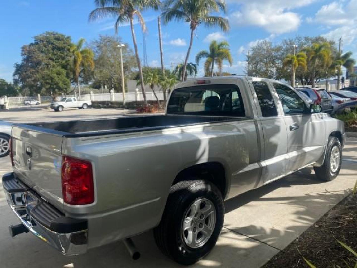 2006 Bright Silver Metallic /Med Slate Gray Dodge Dakota SLT CLUB CAB LOW MILES 55,990 (1D7HE42K06S) with an 3.7L V6 Magnum Engine engine, Automatic transmission, located at 4701 North Dixie Hwy, Pompano Beach, FL, 33064, (954) 422-2889, 26.240938, -80.123474 - OUR WEBPAGE FLORIDACARS1.COM HAS OVER 100 PHOTOS AND FREE CARFAX LINK 2006 DODGE DAKOTA SLT 1 OWNER CLUB CAB 4 DOOR ALL DOORS OPEN VIN: 1D7HE42K06S506201 1 D 7 H E 4 2 K 0 6 S 5 0 6 2 0 1 CLUB CAB PICKUP 3.7L V6 F OHV GASOLINE 22 MPG REAR WHEEL DRIVE Features ABS Brakes Air Conditioning Alloy Wheels- Photo#7