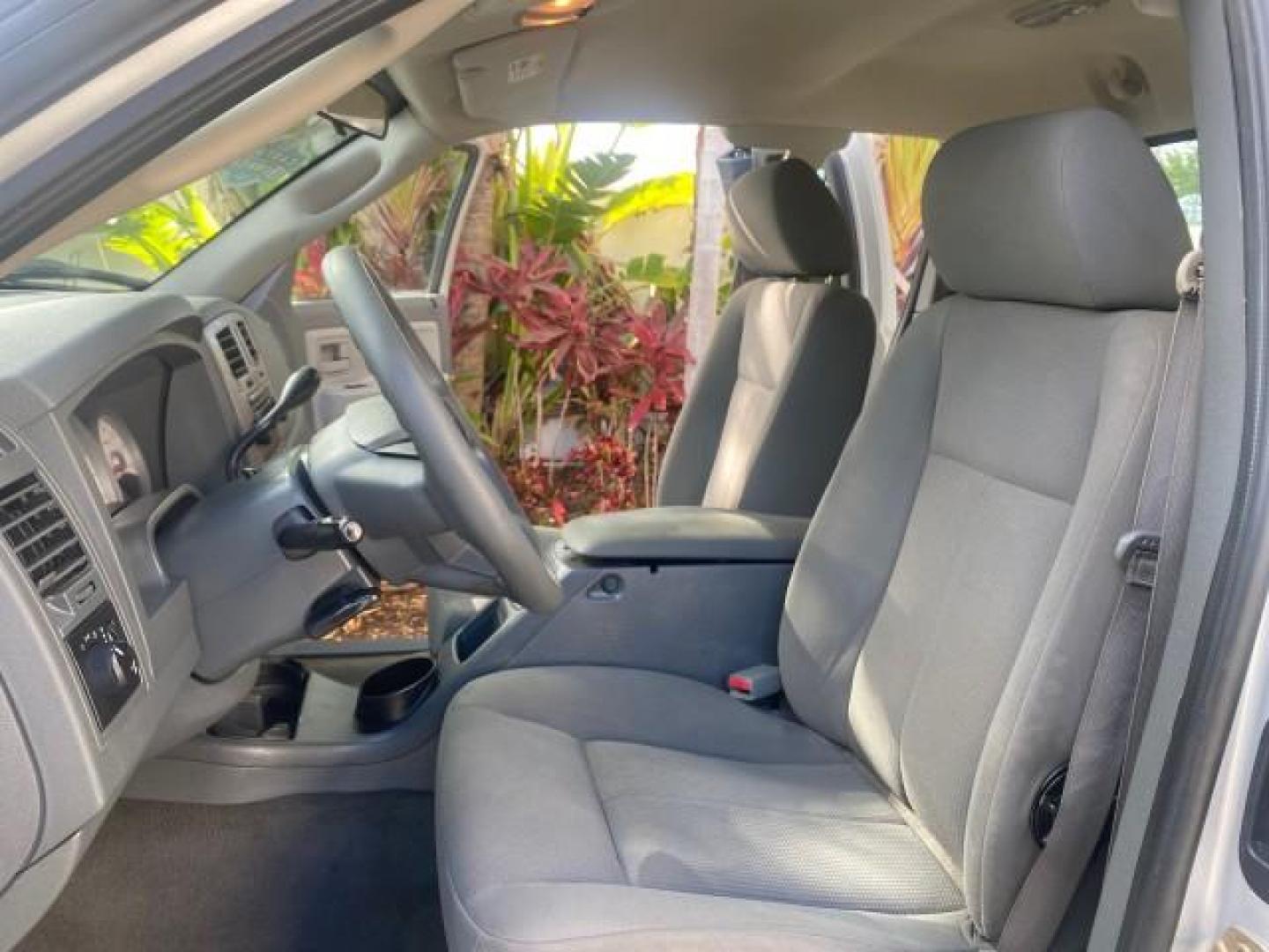 2006 Bright Silver Metallic /Med Slate Gray Dodge Dakota SLT CLUB CAB LOW MILES 55,990 (1D7HE42K06S) with an 3.7L V6 Magnum Engine engine, Automatic transmission, located at 4701 North Dixie Hwy, Pompano Beach, FL, 33064, (954) 422-2889, 26.240938, -80.123474 - OUR WEBPAGE FLORIDACARS1.COM HAS OVER 100 PHOTOS AND FREE CARFAX LINK 2006 DODGE DAKOTA SLT 1 OWNER CLUB CAB 4 DOOR ALL DOORS OPEN VIN: 1D7HE42K06S506201 1 D 7 H E 4 2 K 0 6 S 5 0 6 2 0 1 CLUB CAB PICKUP 3.7L V6 F OHV GASOLINE 22 MPG REAR WHEEL DRIVE Features ABS Brakes Air Conditioning Alloy Wheels- Photo#10