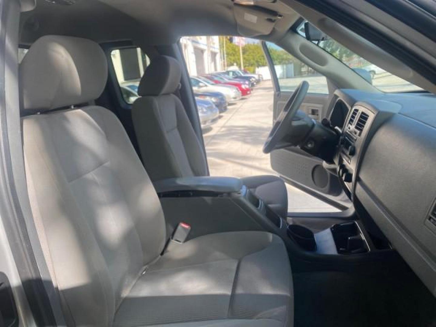 2006 Bright Silver Metallic /Med Slate Gray Dodge Dakota SLT CLUB CAB LOW MILES 55,990 (1D7HE42K06S) with an 3.7L V6 Magnum Engine engine, Automatic transmission, located at 4701 North Dixie Hwy, Pompano Beach, FL, 33064, (954) 422-2889, 26.240938, -80.123474 - OUR WEBPAGE FLORIDACARS1.COM HAS OVER 100 PHOTOS AND FREE CARFAX LINK 2006 DODGE DAKOTA SLT 1 OWNER CLUB CAB 4 DOOR ALL DOORS OPEN VIN: 1D7HE42K06S506201 1 D 7 H E 4 2 K 0 6 S 5 0 6 2 0 1 CLUB CAB PICKUP 3.7L V6 F OHV GASOLINE 22 MPG REAR WHEEL DRIVE Features ABS Brakes Air Conditioning Alloy Wheels- Photo#12