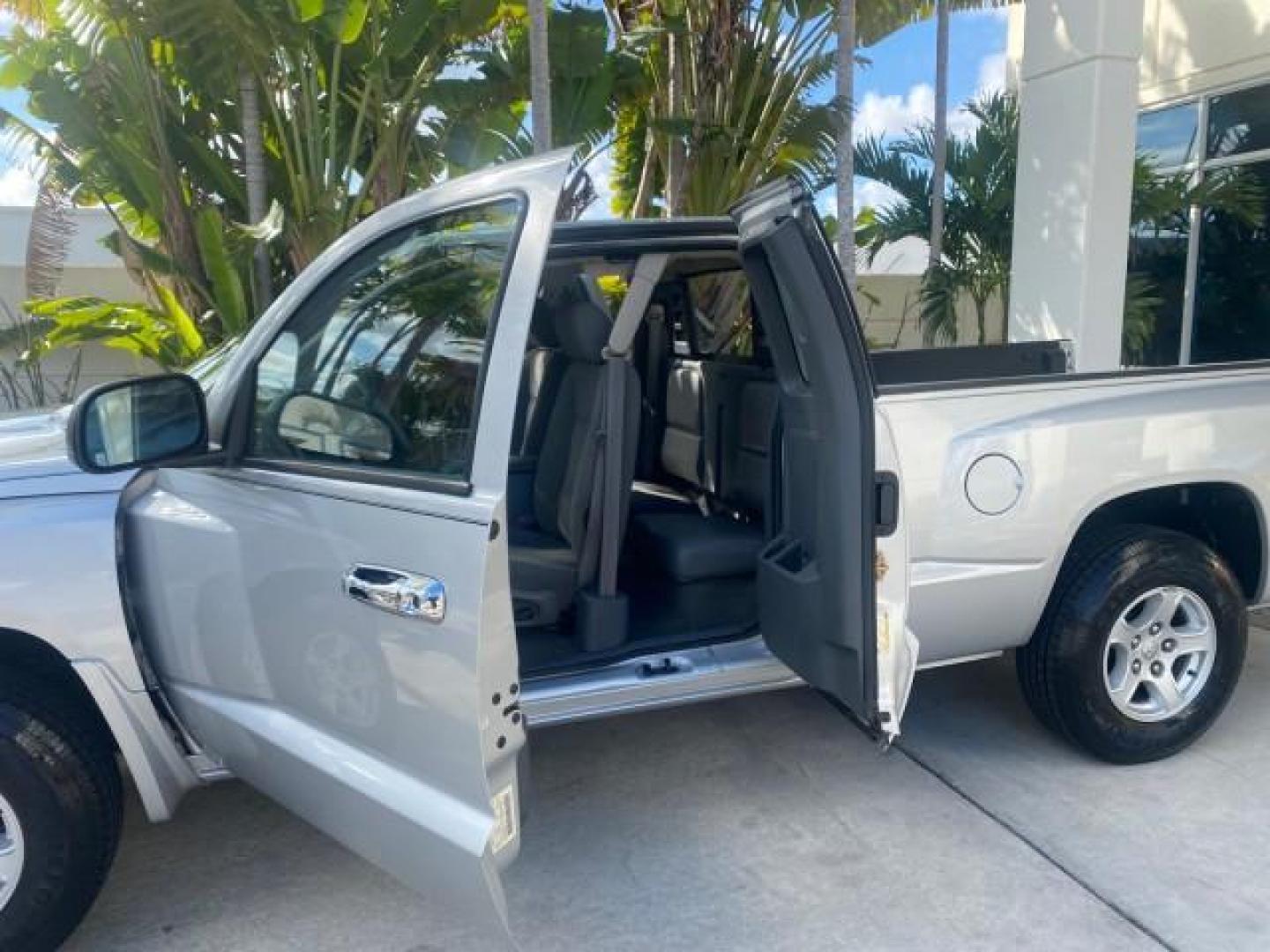 2006 Bright Silver Metallic /Med Slate Gray Dodge Dakota SLT CLUB CAB LOW MILES 55,990 (1D7HE42K06S) with an 3.7L V6 Magnum Engine engine, Automatic transmission, located at 4701 North Dixie Hwy, Pompano Beach, FL, 33064, (954) 422-2889, 26.240938, -80.123474 - OUR WEBPAGE FLORIDACARS1.COM HAS OVER 100 PHOTOS AND FREE CARFAX LINK 2006 DODGE DAKOTA SLT 1 OWNER CLUB CAB 4 DOOR ALL DOORS OPEN VIN: 1D7HE42K06S506201 1 D 7 H E 4 2 K 0 6 S 5 0 6 2 0 1 CLUB CAB PICKUP 3.7L V6 F OHV GASOLINE 22 MPG REAR WHEEL DRIVE Features ABS Brakes Air Conditioning Alloy Wheels- Photo#13