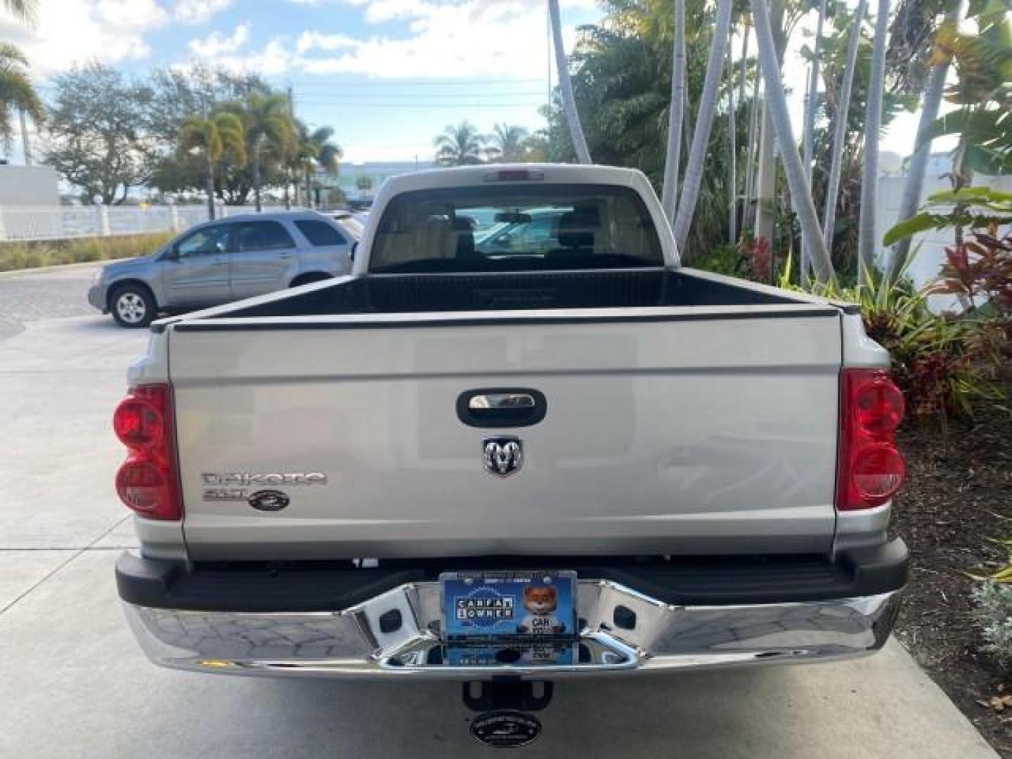 2006 Bright Silver Metallic /Med Slate Gray Dodge Dakota SLT CLUB CAB LOW MILES 55,990 (1D7HE42K06S) with an 3.7L V6 Magnum Engine engine, Automatic transmission, located at 4701 North Dixie Hwy, Pompano Beach, FL, 33064, (954) 422-2889, 26.240938, -80.123474 - OUR WEBPAGE FLORIDACARS1.COM HAS OVER 100 PHOTOS AND FREE CARFAX LINK 2006 DODGE DAKOTA SLT 1 OWNER CLUB CAB 4 DOOR ALL DOORS OPEN VIN: 1D7HE42K06S506201 1 D 7 H E 4 2 K 0 6 S 5 0 6 2 0 1 CLUB CAB PICKUP 3.7L V6 F OHV GASOLINE 22 MPG REAR WHEEL DRIVE Features ABS Brakes Air Conditioning Alloy Wheels- Photo#35