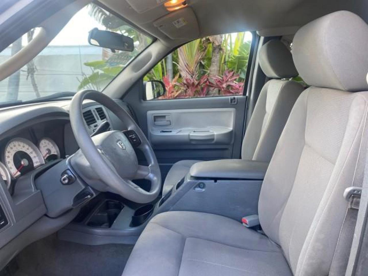 2006 Bright Silver Metallic /Med Slate Gray Dodge Dakota SLT CLUB CAB LOW MILES 55,990 (1D7HE42K06S) with an 3.7L V6 Magnum Engine engine, Automatic transmission, located at 4701 North Dixie Hwy, Pompano Beach, FL, 33064, (954) 422-2889, 26.240938, -80.123474 - OUR WEBPAGE FLORIDACARS1.COM HAS OVER 100 PHOTOS AND FREE CARFAX LINK 2006 DODGE DAKOTA SLT 1 OWNER CLUB CAB 4 DOOR ALL DOORS OPEN VIN: 1D7HE42K06S506201 1 D 7 H E 4 2 K 0 6 S 5 0 6 2 0 1 CLUB CAB PICKUP 3.7L V6 F OHV GASOLINE 22 MPG REAR WHEEL DRIVE Features ABS Brakes Air Conditioning Alloy Wheels- Photo#44