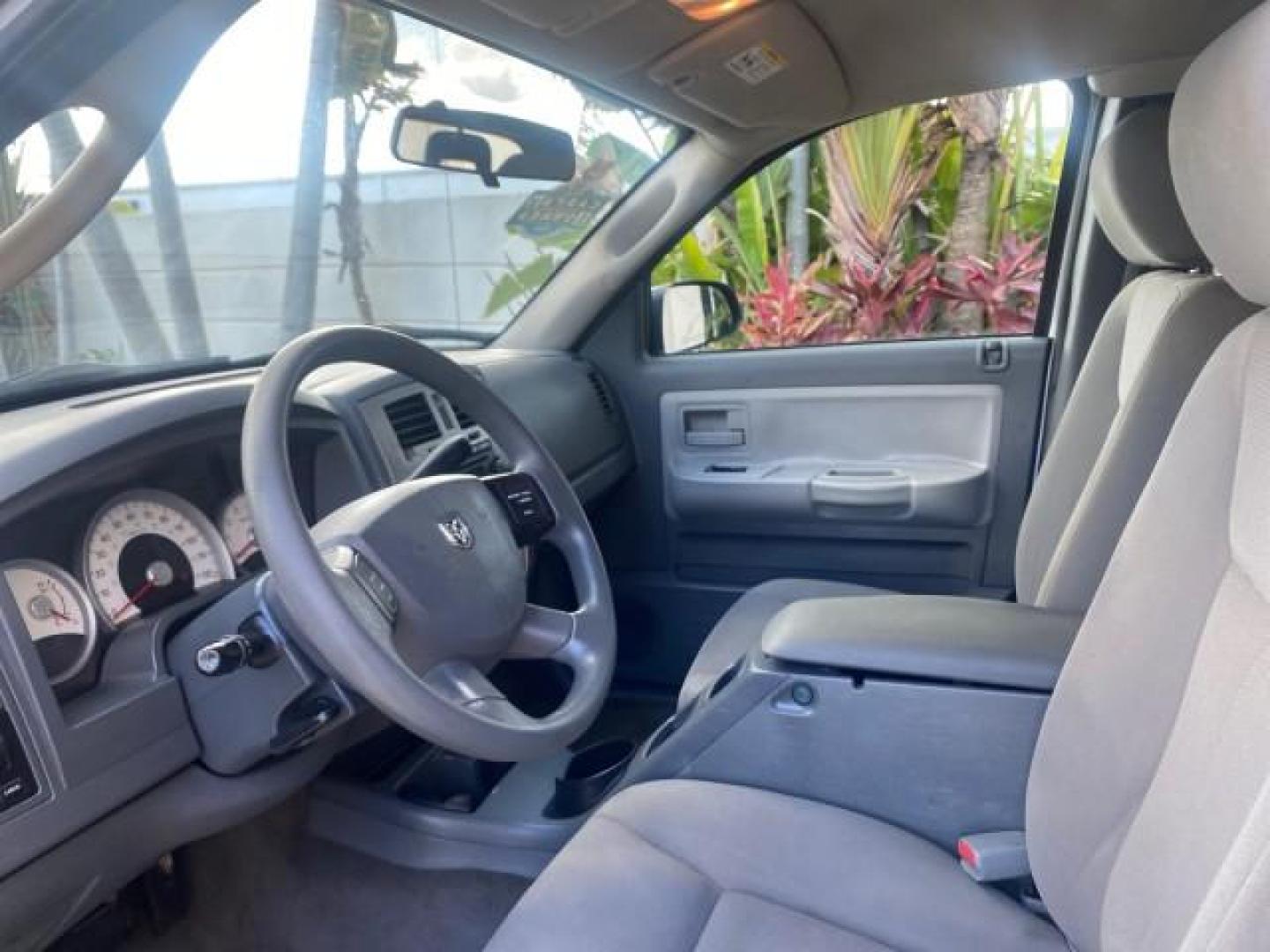 2006 Bright Silver Metallic /Med Slate Gray Dodge Dakota SLT CLUB CAB LOW MILES 55,990 (1D7HE42K06S) with an 3.7L V6 Magnum Engine engine, Automatic transmission, located at 4701 North Dixie Hwy, Pompano Beach, FL, 33064, (954) 422-2889, 26.240938, -80.123474 - OUR WEBPAGE FLORIDACARS1.COM HAS OVER 100 PHOTOS AND FREE CARFAX LINK 2006 DODGE DAKOTA SLT 1 OWNER CLUB CAB 4 DOOR ALL DOORS OPEN VIN: 1D7HE42K06S506201 1 D 7 H E 4 2 K 0 6 S 5 0 6 2 0 1 CLUB CAB PICKUP 3.7L V6 F OHV GASOLINE 22 MPG REAR WHEEL DRIVE Features ABS Brakes Air Conditioning Alloy Wheels- Photo#45