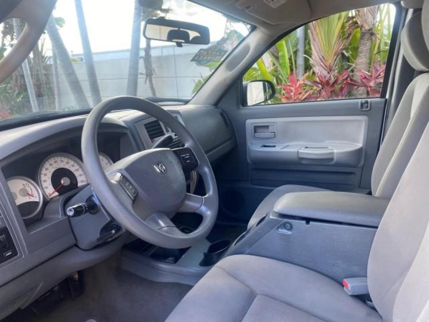 2006 Bright Silver Metallic /Med Slate Gray Dodge Dakota SLT CLUB CAB LOW MILES 55,990 (1D7HE42K06S) with an 3.7L V6 Magnum Engine engine, Automatic transmission, located at 4701 North Dixie Hwy, Pompano Beach, FL, 33064, (954) 422-2889, 26.240938, -80.123474 - OUR WEBPAGE FLORIDACARS1.COM HAS OVER 100 PHOTOS AND FREE CARFAX LINK 2006 DODGE DAKOTA SLT 1 OWNER CLUB CAB 4 DOOR ALL DOORS OPEN VIN: 1D7HE42K06S506201 1 D 7 H E 4 2 K 0 6 S 5 0 6 2 0 1 CLUB CAB PICKUP 3.7L V6 F OHV GASOLINE 22 MPG REAR WHEEL DRIVE Features ABS Brakes Air Conditioning Alloy Wheels- Photo#46