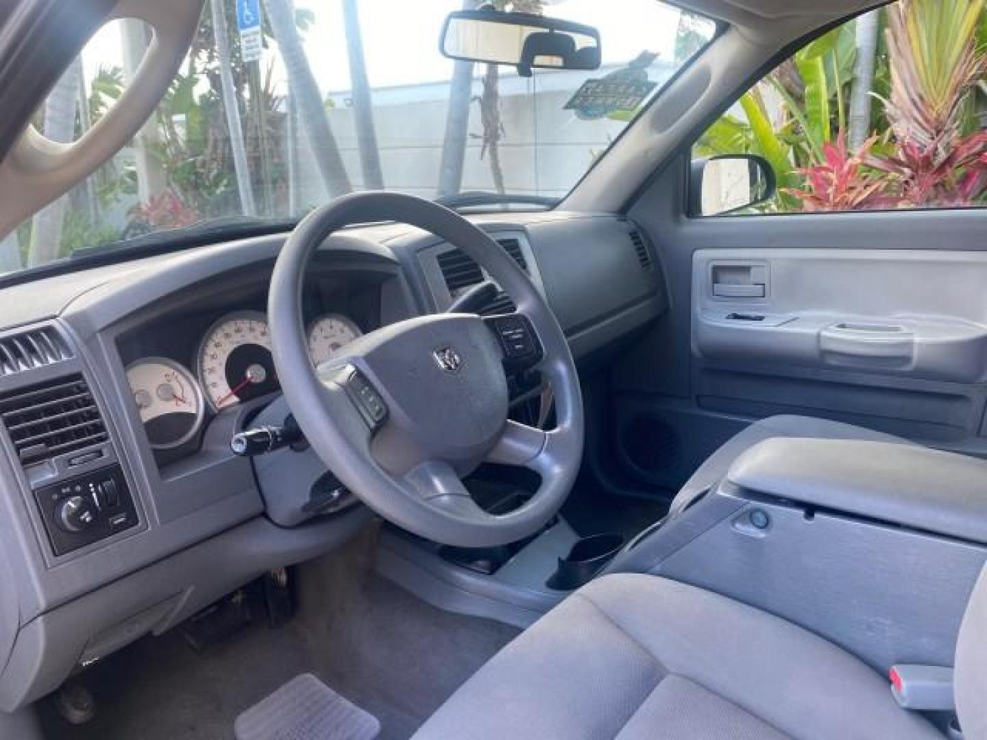 2006 Bright Silver Metallic /Med Slate Gray Dodge Dakota SLT CLUB CAB LOW MILES 55,990 (1D7HE42K06S) with an 3.7L V6 Magnum Engine engine, Automatic transmission, located at 4701 North Dixie Hwy, Pompano Beach, FL, 33064, (954) 422-2889, 26.240938, -80.123474 - OUR WEBPAGE FLORIDACARS1.COM HAS OVER 100 PHOTOS AND FREE CARFAX LINK 2006 DODGE DAKOTA SLT 1 OWNER CLUB CAB 4 DOOR ALL DOORS OPEN VIN: 1D7HE42K06S506201 1 D 7 H E 4 2 K 0 6 S 5 0 6 2 0 1 CLUB CAB PICKUP 3.7L V6 F OHV GASOLINE 22 MPG REAR WHEEL DRIVE Features ABS Brakes Air Conditioning Alloy Wheels- Photo#47