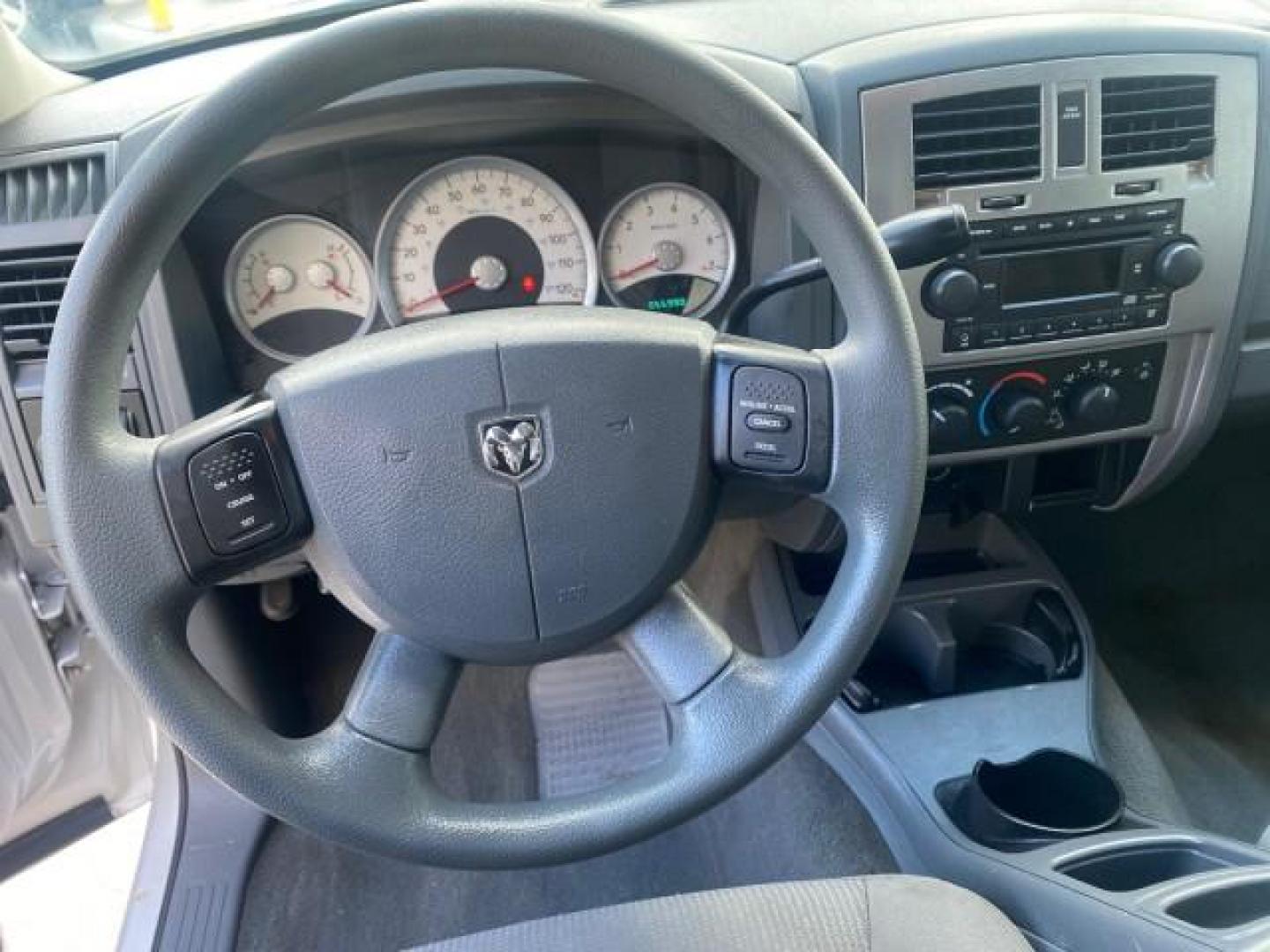 2006 Bright Silver Metallic /Med Slate Gray Dodge Dakota SLT CLUB CAB LOW MILES 55,990 (1D7HE42K06S) with an 3.7L V6 Magnum Engine engine, Automatic transmission, located at 4701 North Dixie Hwy, Pompano Beach, FL, 33064, (954) 422-2889, 26.240938, -80.123474 - OUR WEBPAGE FLORIDACARS1.COM HAS OVER 100 PHOTOS AND FREE CARFAX LINK 2006 DODGE DAKOTA SLT 1 OWNER CLUB CAB 4 DOOR ALL DOORS OPEN VIN: 1D7HE42K06S506201 1 D 7 H E 4 2 K 0 6 S 5 0 6 2 0 1 CLUB CAB PICKUP 3.7L V6 F OHV GASOLINE 22 MPG REAR WHEEL DRIVE Features ABS Brakes Air Conditioning Alloy Wheels- Photo#48