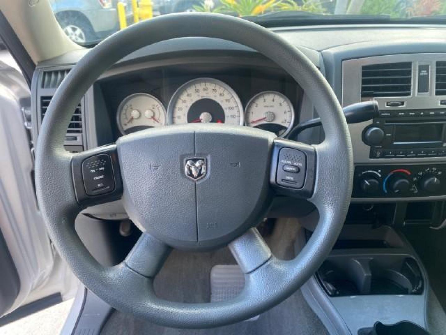 2006 Bright Silver Metallic /Med Slate Gray Dodge Dakota SLT CLUB CAB LOW MILES 55,990 (1D7HE42K06S) with an 3.7L V6 Magnum Engine engine, Automatic transmission, located at 4701 North Dixie Hwy, Pompano Beach, FL, 33064, (954) 422-2889, 26.240938, -80.123474 - OUR WEBPAGE FLORIDACARS1.COM HAS OVER 100 PHOTOS AND FREE CARFAX LINK 2006 DODGE DAKOTA SLT 1 OWNER CLUB CAB 4 DOOR ALL DOORS OPEN VIN: 1D7HE42K06S506201 1 D 7 H E 4 2 K 0 6 S 5 0 6 2 0 1 CLUB CAB PICKUP 3.7L V6 F OHV GASOLINE 22 MPG REAR WHEEL DRIVE Features ABS Brakes Air Conditioning Alloy Wheels- Photo#49