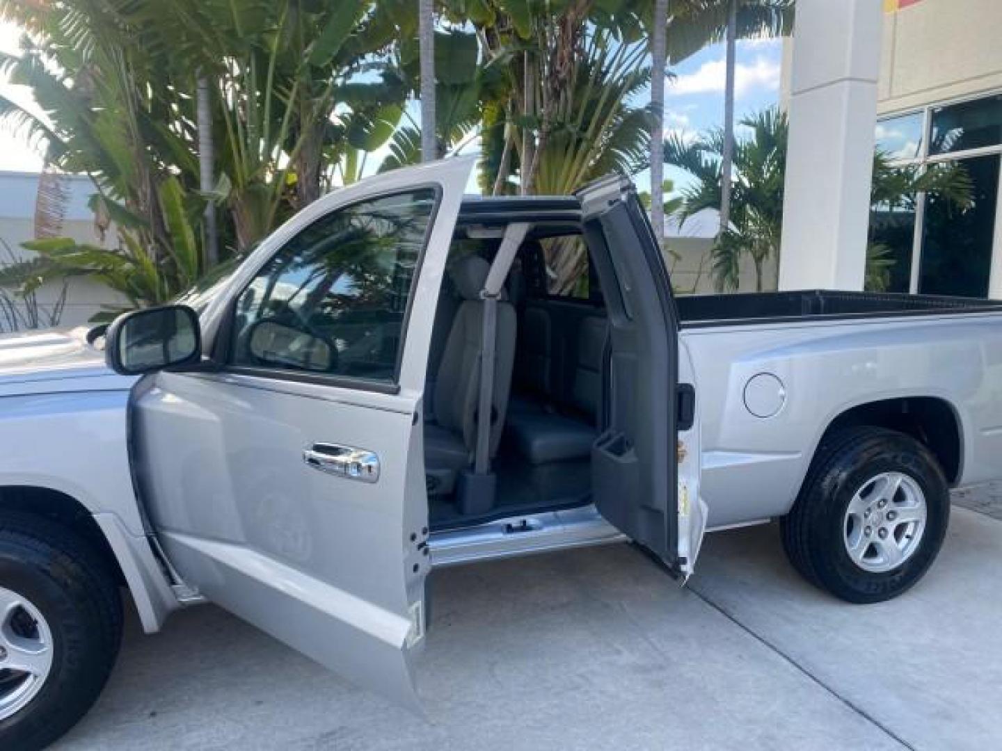 2006 Bright Silver Metallic /Med Slate Gray Dodge Dakota SLT CLUB CAB LOW MILES 55,990 (1D7HE42K06S) with an 3.7L V6 Magnum Engine engine, Automatic transmission, located at 4701 North Dixie Hwy, Pompano Beach, FL, 33064, (954) 422-2889, 26.240938, -80.123474 - OUR WEBPAGE FLORIDACARS1.COM HAS OVER 100 PHOTOS AND FREE CARFAX LINK 2006 DODGE DAKOTA SLT 1 OWNER CLUB CAB 4 DOOR ALL DOORS OPEN VIN: 1D7HE42K06S506201 1 D 7 H E 4 2 K 0 6 S 5 0 6 2 0 1 CLUB CAB PICKUP 3.7L V6 F OHV GASOLINE 22 MPG REAR WHEEL DRIVE Features ABS Brakes Air Conditioning Alloy Wheels- Photo#72