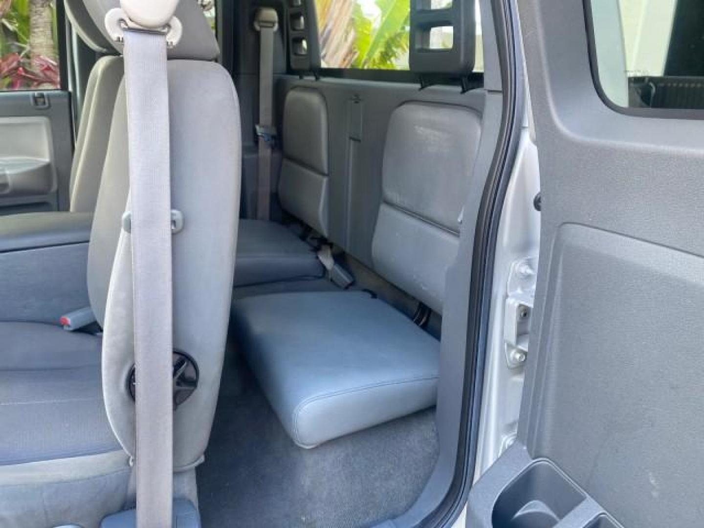 2006 Bright Silver Metallic /Med Slate Gray Dodge Dakota SLT CLUB CAB LOW MILES 55,990 (1D7HE42K06S) with an 3.7L V6 Magnum Engine engine, Automatic transmission, located at 4701 North Dixie Hwy, Pompano Beach, FL, 33064, (954) 422-2889, 26.240938, -80.123474 - OUR WEBPAGE FLORIDACARS1.COM HAS OVER 100 PHOTOS AND FREE CARFAX LINK 2006 DODGE DAKOTA SLT 1 OWNER CLUB CAB 4 DOOR ALL DOORS OPEN VIN: 1D7HE42K06S506201 1 D 7 H E 4 2 K 0 6 S 5 0 6 2 0 1 CLUB CAB PICKUP 3.7L V6 F OHV GASOLINE 22 MPG REAR WHEEL DRIVE Features ABS Brakes Air Conditioning Alloy Wheels- Photo#74