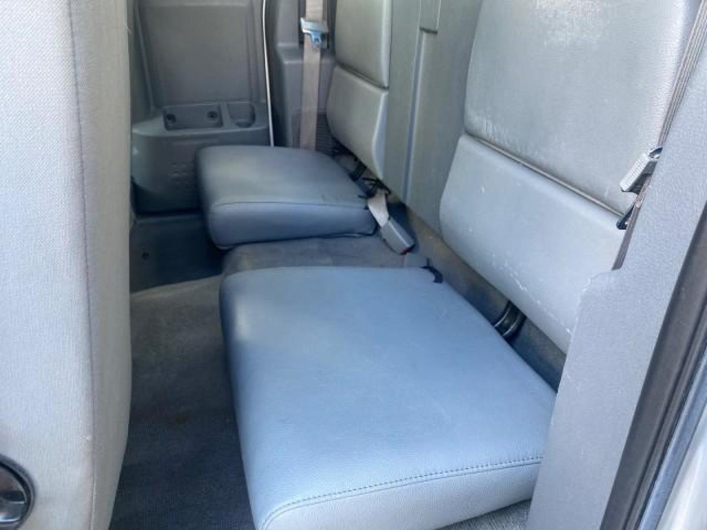 2006 Bright Silver Metallic /Med Slate Gray Dodge Dakota SLT CLUB CAB LOW MILES 55,990 (1D7HE42K06S) with an 3.7L V6 Magnum Engine engine, Automatic transmission, located at 4701 North Dixie Hwy, Pompano Beach, FL, 33064, (954) 422-2889, 26.240938, -80.123474 - OUR WEBPAGE FLORIDACARS1.COM HAS OVER 100 PHOTOS AND FREE CARFAX LINK 2006 DODGE DAKOTA SLT 1 OWNER CLUB CAB 4 DOOR ALL DOORS OPEN VIN: 1D7HE42K06S506201 1 D 7 H E 4 2 K 0 6 S 5 0 6 2 0 1 CLUB CAB PICKUP 3.7L V6 F OHV GASOLINE 22 MPG REAR WHEEL DRIVE Features ABS Brakes Air Conditioning Alloy Wheels- Photo#77