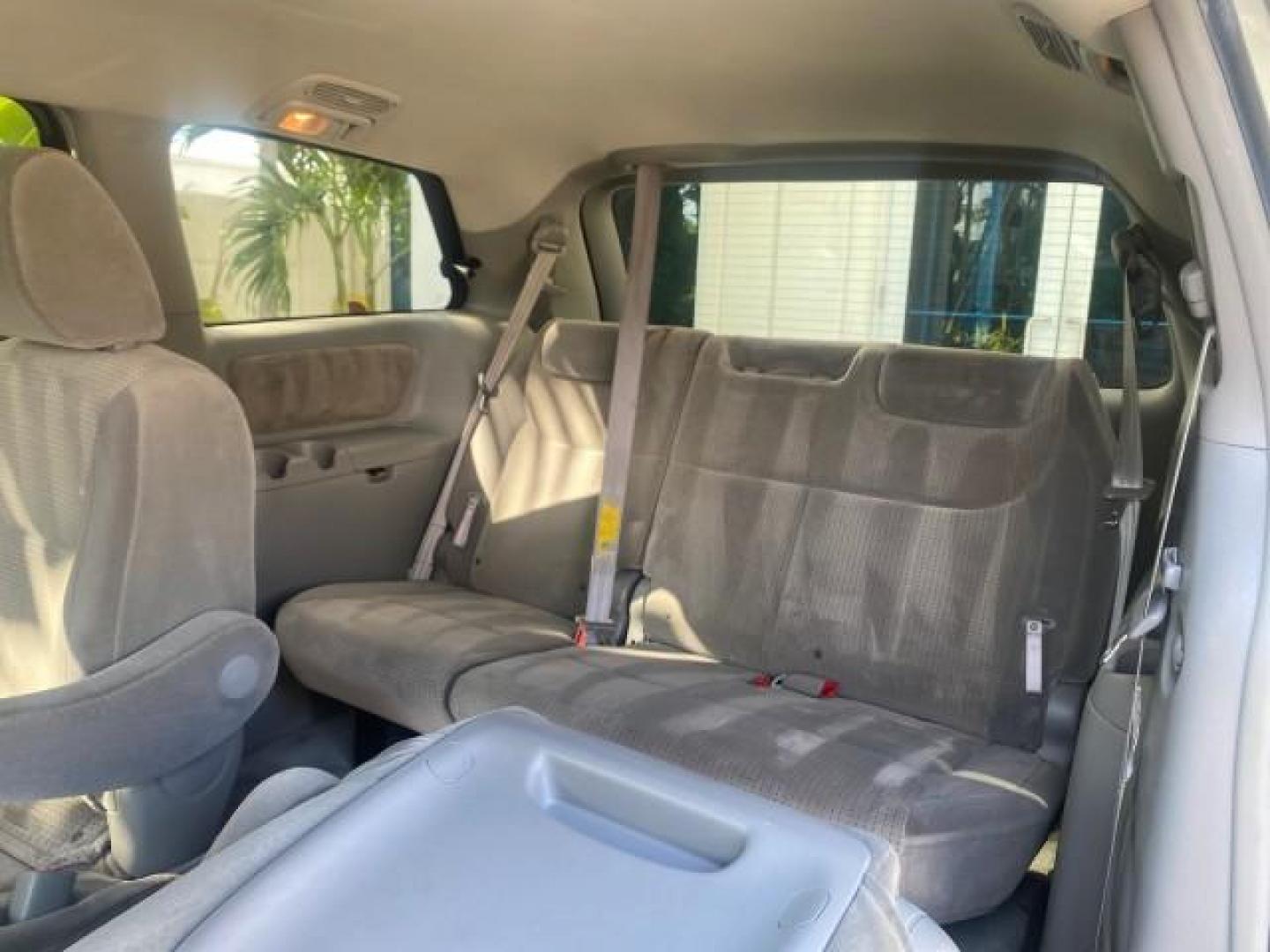2010 Silver Pine Mica /Stone Toyota Sienna LE LOW MILES 41,871 1 OWNER 7 PASSENGER (5TDKK4CC9AS) with an 3.5L DOHC 24-Valve VVT-i V6 Engine engine, Automatic transmission, located at 4701 North Dixie Hwy, Pompano Beach, FL, 33064, (954) 422-2889, 26.240938, -80.123474 - OUR WEBPAGE FLORIDACARS1.COM HAS OVER 100 PHOTOS AND FREE CARFAX LINK 2010 TOYOTA SIENNA LE 7-PASSENGER 1 OWNER FLORIDA VIN: 5TDKK4CC9AS339371 5 T D K K 4 C C 9 A S 3 3 9 3 7 1 VAN 3.5L V6 F DOHC 24V GASOLINE 23 MPG FRONT WHEEL DRIVE Features ABS Brakes Air Conditioning AM/FM Stereo Automatic Transm - Photo#80