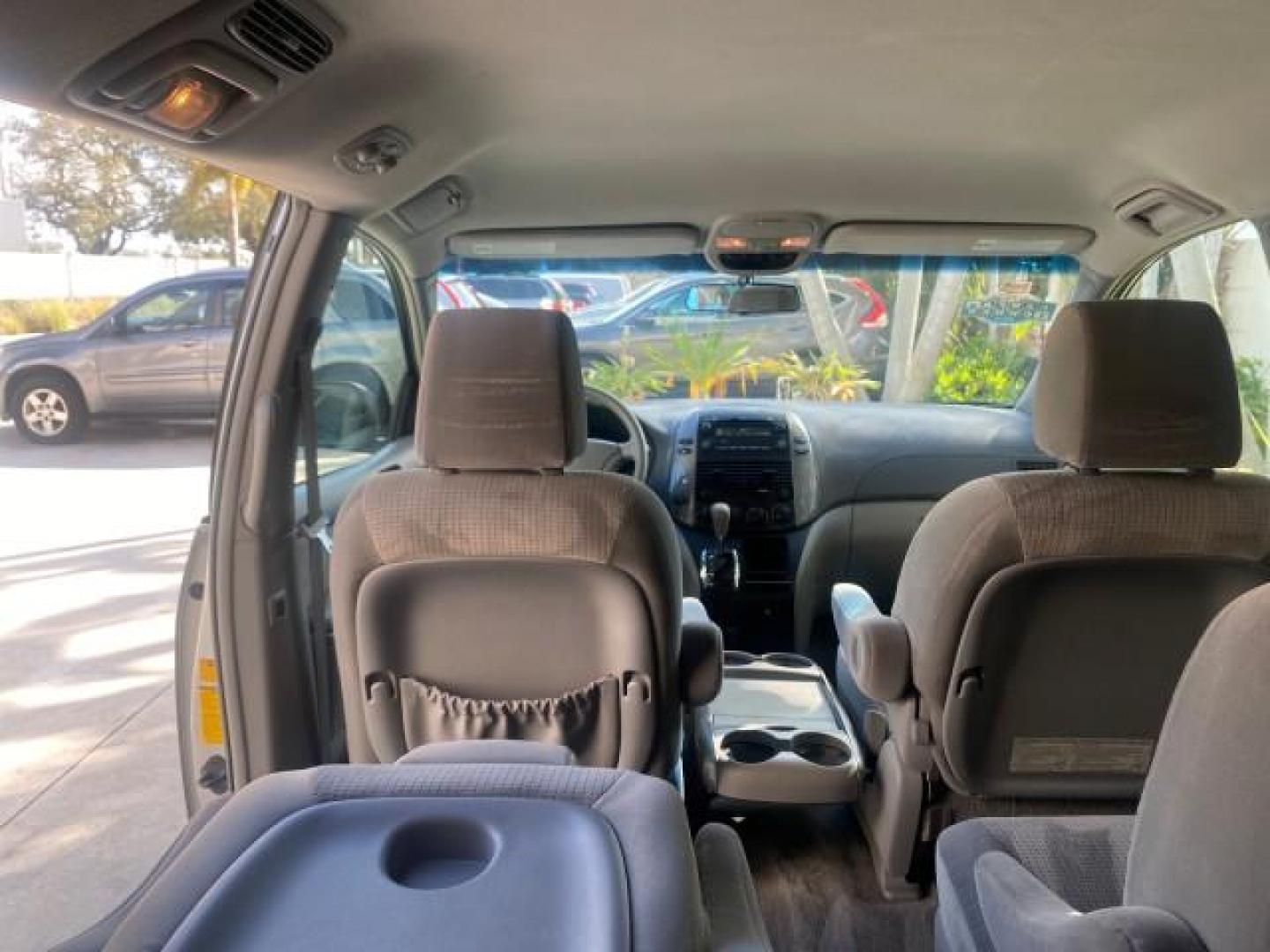 2010 Silver Pine Mica /Stone Toyota Sienna LE LOW MILES 41,871 1 OWNER 7 PASSENGER (5TDKK4CC9AS) with an 3.5L DOHC 24-Valve VVT-i V6 Engine engine, Automatic transmission, located at 4701 North Dixie Hwy, Pompano Beach, FL, 33064, (954) 422-2889, 26.240938, -80.123474 - OUR WEBPAGE FLORIDACARS1.COM HAS OVER 100 PHOTOS AND FREE CARFAX LINK 2010 TOYOTA SIENNA LE 7-PASSENGER 1 OWNER FLORIDA VIN: 5TDKK4CC9AS339371 5 T D K K 4 C C 9 A S 3 3 9 3 7 1 VAN 3.5L V6 F DOHC 24V GASOLINE 23 MPG FRONT WHEEL DRIVE Features ABS Brakes Air Conditioning AM/FM Stereo Automatic Transm - Photo#85