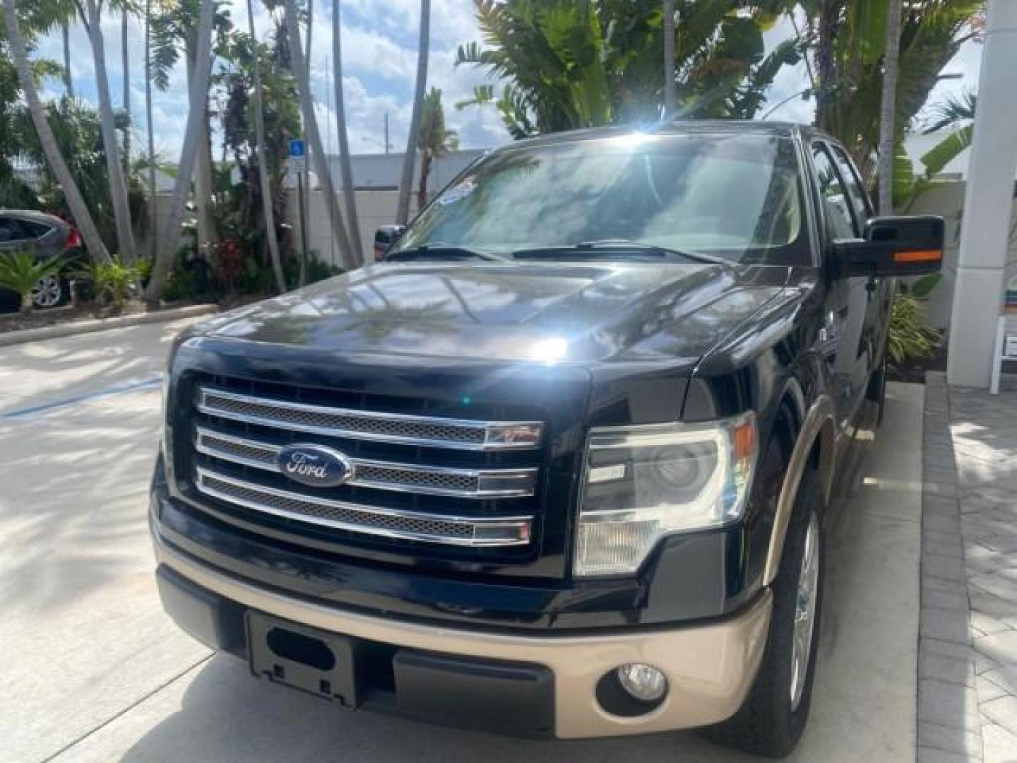2013 Tuxedo Black Metallic /Chaparral w/Pale Adobe Interior Ford F-150 King Ranch LOW MILES 60,151 1 OWNER (1FTFW1CF6DK) with an 5.0L V8 FFV Engine engine, Automatic transmission, located at 4701 North Dixie Hwy, Pompano Beach, FL, 33064, (954) 422-2889, 26.240938, -80.123474 - OUR WEBPAGE FLORIDACARS1.COM HAS OVER 100 PHOTOS AND FREE CARFAX LINK 2013 FORD F-150 KING RANCH 1 OWNER FLORIDA SUNROOF LOADED VIN: 1FTFW1CF6DKF83375 1 F T F W 1 C F 6 D K F 8 3 3 7 5 CREW PICKUP 5.0L V8 F DOHC 32V FLEX FUEL 21 MPG REAR WHEEL DRIVE Features A/C Seat(s) ABS Brakes Air Conditioning A - Photo#4