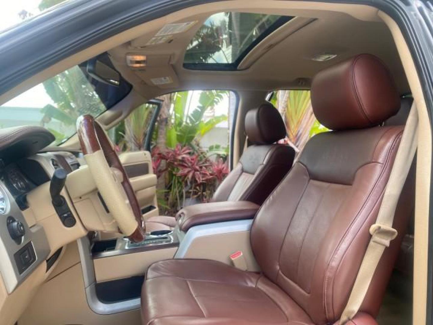 2013 Tuxedo Black Metallic /Chaparral w/Pale Adobe Interior Ford F-150 King Ranch LOW MILES 60,151 1 OWNER (1FTFW1CF6DK) with an 5.0L V8 FFV Engine engine, Automatic transmission, located at 4701 North Dixie Hwy, Pompano Beach, FL, 33064, (954) 422-2889, 26.240938, -80.123474 - OUR WEBPAGE FLORIDACARS1.COM HAS OVER 100 PHOTOS AND FREE CARFAX LINK 2013 FORD F-150 KING RANCH 1 OWNER FLORIDA SUNROOF LOADED VIN: 1FTFW1CF6DKF83375 1 F T F W 1 C F 6 D K F 8 3 3 7 5 CREW PICKUP 5.0L V8 F DOHC 32V FLEX FUEL 21 MPG REAR WHEEL DRIVE Features A/C Seat(s) ABS Brakes Air Conditioning A - Photo#11