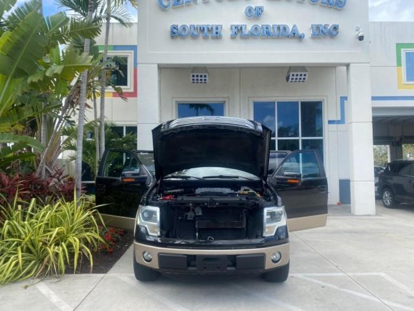 2013 Tuxedo Black Metallic /Chaparral w/Pale Adobe Interior Ford F-150 King Ranch LOW MILES 60,151 1 OWNER (1FTFW1CF6DK) with an 5.0L V8 FFV Engine engine, Automatic transmission, located at 4701 North Dixie Hwy, Pompano Beach, FL, 33064, (954) 422-2889, 26.240938, -80.123474 - OUR WEBPAGE FLORIDACARS1.COM HAS OVER 100 PHOTOS AND FREE CARFAX LINK 2013 FORD F-150 KING RANCH 1 OWNER FLORIDA SUNROOF LOADED VIN: 1FTFW1CF6DKF83375 1 F T F W 1 C F 6 D K F 8 3 3 7 5 CREW PICKUP 5.0L V8 F DOHC 32V FLEX FUEL 21 MPG REAR WHEEL DRIVE Features A/C Seat(s) ABS Brakes Air Conditioning A - Photo#17
