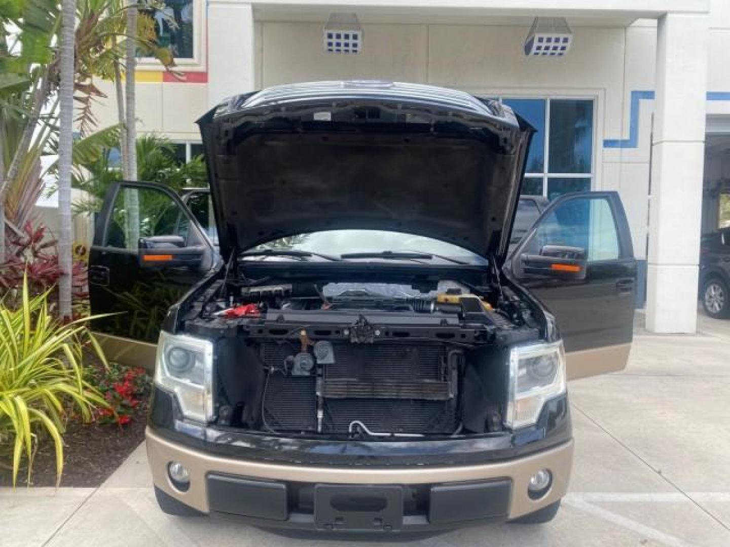 2013 Tuxedo Black Metallic /Chaparral w/Pale Adobe Interior Ford F-150 King Ranch LOW MILES 60,151 1 OWNER (1FTFW1CF6DK) with an 5.0L V8 FFV Engine engine, Automatic transmission, located at 4701 North Dixie Hwy, Pompano Beach, FL, 33064, (954) 422-2889, 26.240938, -80.123474 - OUR WEBPAGE FLORIDACARS1.COM HAS OVER 100 PHOTOS AND FREE CARFAX LINK 2013 FORD F-150 KING RANCH 1 OWNER FLORIDA SUNROOF LOADED VIN: 1FTFW1CF6DKF83375 1 F T F W 1 C F 6 D K F 8 3 3 7 5 CREW PICKUP 5.0L V8 F DOHC 32V FLEX FUEL 21 MPG REAR WHEEL DRIVE Features A/C Seat(s) ABS Brakes Air Conditioning A - Photo#18