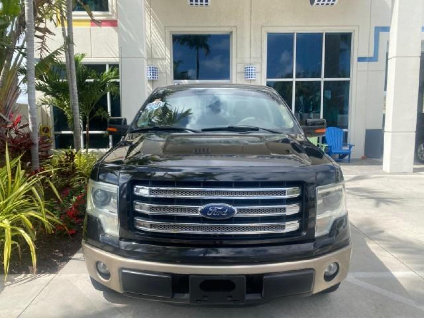 2013 Tuxedo Black Metallic /Chaparral w/Pale Adobe Interior Ford F-150 King Ranch LOW MILES 60,151 1 OWNER (1FTFW1CF6DK) with an 5.0L V8 FFV Engine engine, Automatic transmission, located at 4701 North Dixie Hwy, Pompano Beach, FL, 33064, (954) 422-2889, 26.240938, -80.123474 - OUR WEBPAGE FLORIDACARS1.COM HAS OVER 100 PHOTOS AND FREE CARFAX LINK 2013 FORD F-150 KING RANCH 1 OWNER FLORIDA SUNROOF LOADED VIN: 1FTFW1CF6DKF83375 1 F T F W 1 C F 6 D K F 8 3 3 7 5 CREW PICKUP 5.0L V8 F DOHC 32V FLEX FUEL 21 MPG REAR WHEEL DRIVE Features A/C Seat(s) ABS Brakes Air Conditioning A - Photo#28