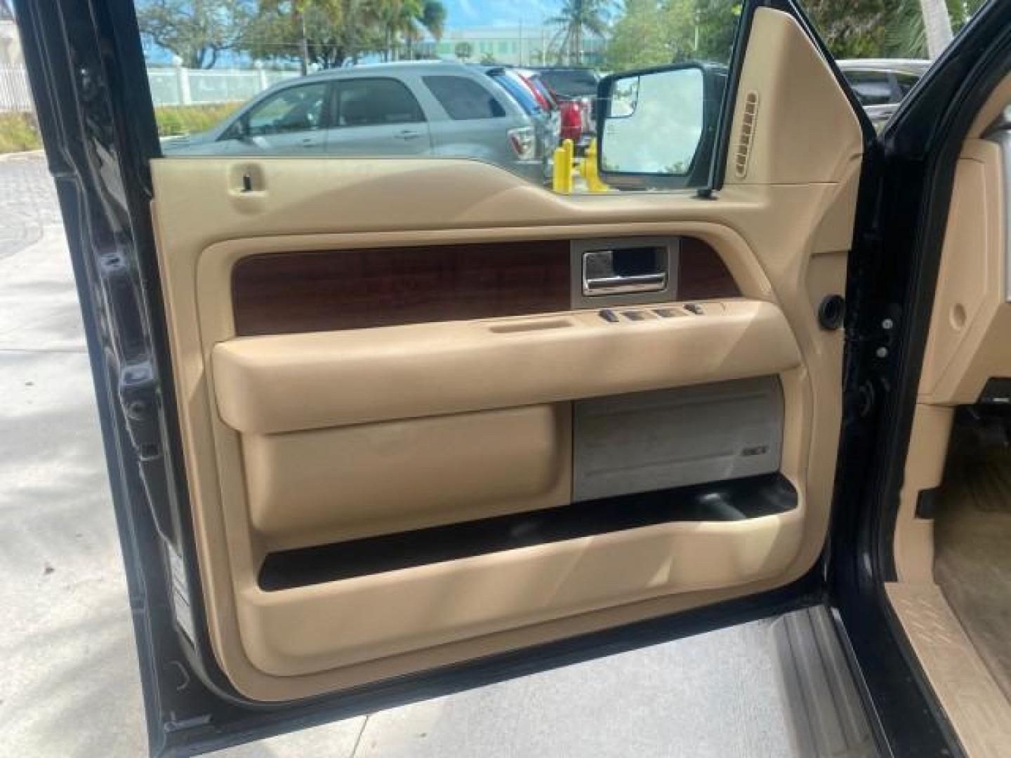 2013 Tuxedo Black Metallic /Chaparral w/Pale Adobe Interior Ford F-150 King Ranch LOW MILES 60,151 1 OWNER (1FTFW1CF6DK) with an 5.0L V8 FFV Engine engine, Automatic transmission, located at 4701 North Dixie Hwy, Pompano Beach, FL, 33064, (954) 422-2889, 26.240938, -80.123474 - OUR WEBPAGE FLORIDACARS1.COM HAS OVER 100 PHOTOS AND FREE CARFAX LINK 2013 FORD F-150 KING RANCH 1 OWNER FLORIDA SUNROOF LOADED VIN: 1FTFW1CF6DKF83375 1 F T F W 1 C F 6 D K F 8 3 3 7 5 CREW PICKUP 5.0L V8 F DOHC 32V FLEX FUEL 21 MPG REAR WHEEL DRIVE Features A/C Seat(s) ABS Brakes Air Conditioning A - Photo#44