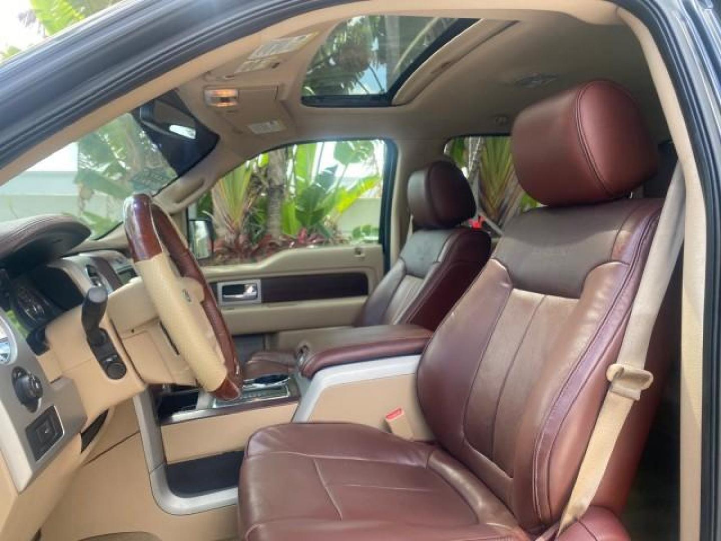 2013 Tuxedo Black Metallic /Chaparral w/Pale Adobe Interior Ford F-150 King Ranch LOW MILES 60,151 1 OWNER (1FTFW1CF6DK) with an 5.0L V8 FFV Engine engine, Automatic transmission, located at 4701 North Dixie Hwy, Pompano Beach, FL, 33064, (954) 422-2889, 26.240938, -80.123474 - OUR WEBPAGE FLORIDACARS1.COM HAS OVER 100 PHOTOS AND FREE CARFAX LINK 2013 FORD F-150 KING RANCH 1 OWNER FLORIDA SUNROOF LOADED VIN: 1FTFW1CF6DKF83375 1 F T F W 1 C F 6 D K F 8 3 3 7 5 CREW PICKUP 5.0L V8 F DOHC 32V FLEX FUEL 21 MPG REAR WHEEL DRIVE Features A/C Seat(s) ABS Brakes Air Conditioning A - Photo#45