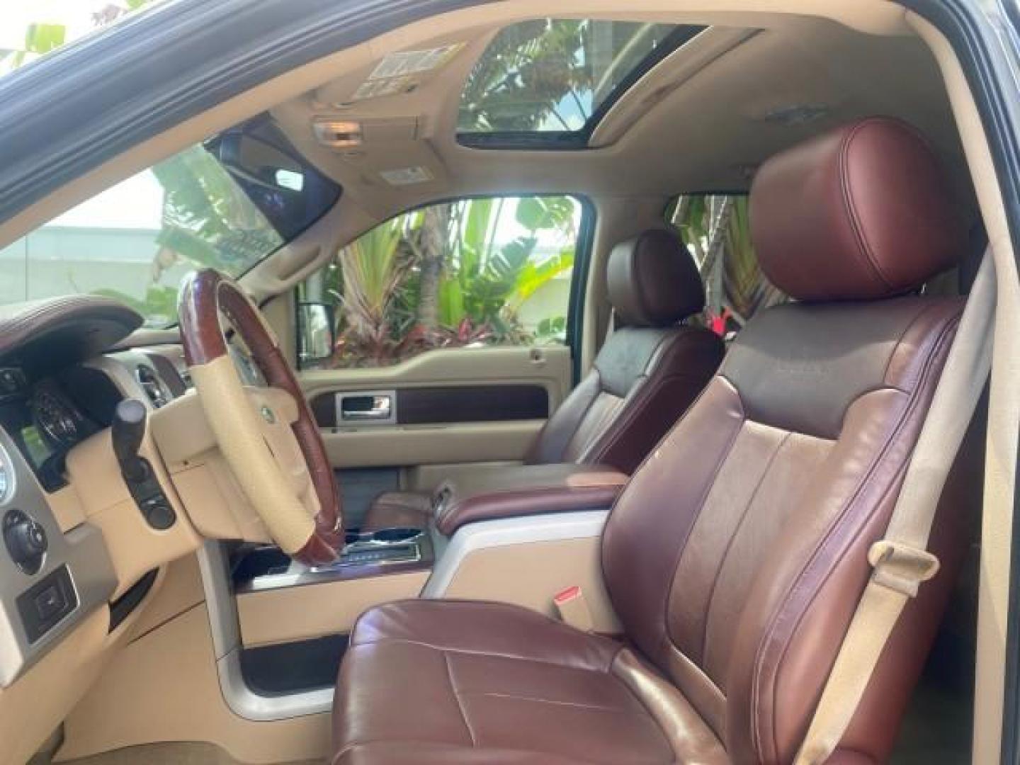 2013 Tuxedo Black Metallic /Chaparral w/Pale Adobe Interior Ford F-150 King Ranch LOW MILES 60,151 1 OWNER (1FTFW1CF6DK) with an 5.0L V8 FFV Engine engine, Automatic transmission, located at 4701 North Dixie Hwy, Pompano Beach, FL, 33064, (954) 422-2889, 26.240938, -80.123474 - OUR WEBPAGE FLORIDACARS1.COM HAS OVER 100 PHOTOS AND FREE CARFAX LINK 2013 FORD F-150 KING RANCH 1 OWNER FLORIDA SUNROOF LOADED VIN: 1FTFW1CF6DKF83375 1 F T F W 1 C F 6 D K F 8 3 3 7 5 CREW PICKUP 5.0L V8 F DOHC 32V FLEX FUEL 21 MPG REAR WHEEL DRIVE Features A/C Seat(s) ABS Brakes Air Conditioning A - Photo#46