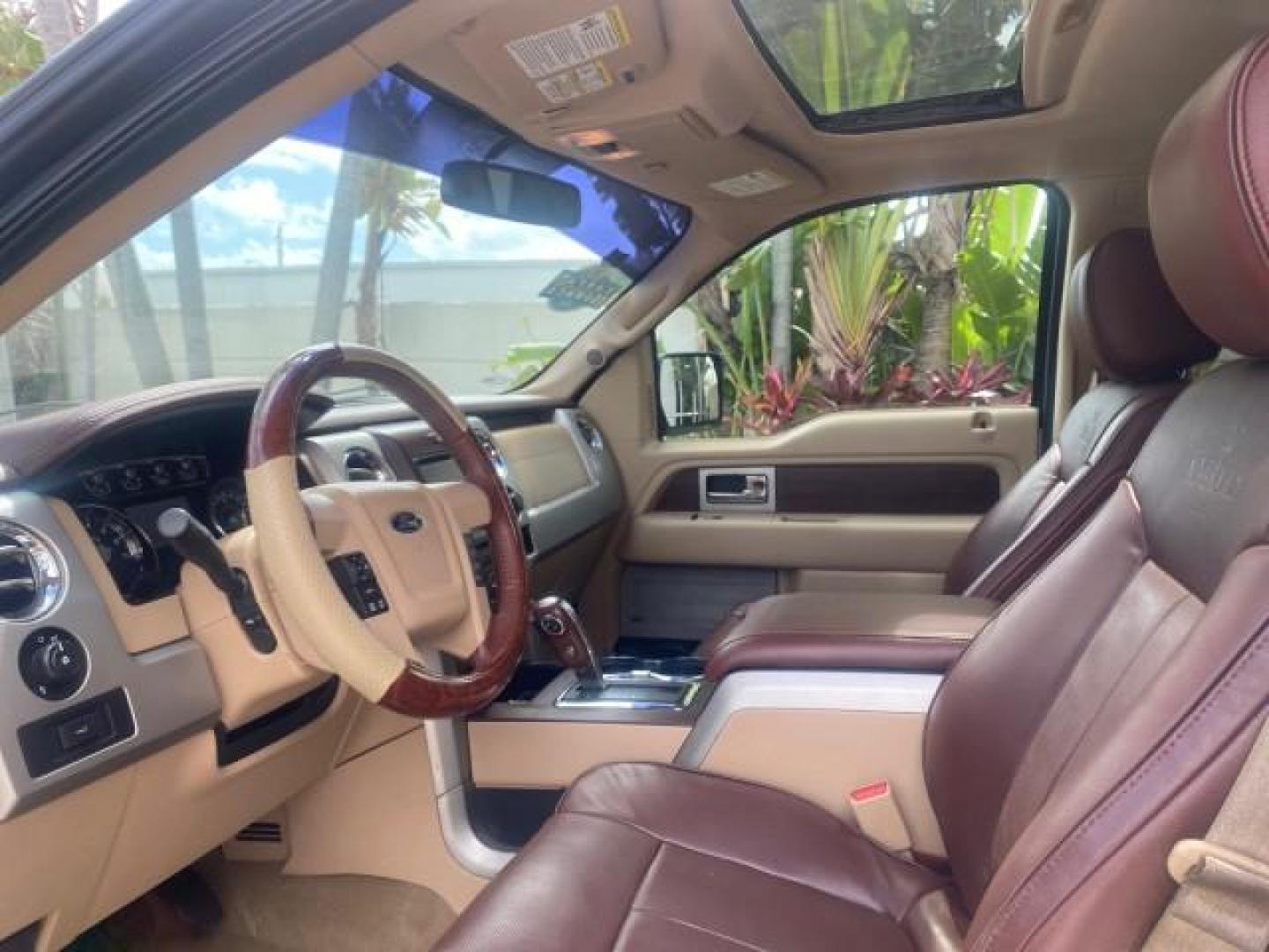 2013 Tuxedo Black Metallic /Chaparral w/Pale Adobe Interior Ford F-150 King Ranch LOW MILES 60,151 1 OWNER (1FTFW1CF6DK) with an 5.0L V8 FFV Engine engine, Automatic transmission, located at 4701 North Dixie Hwy, Pompano Beach, FL, 33064, (954) 422-2889, 26.240938, -80.123474 - OUR WEBPAGE FLORIDACARS1.COM HAS OVER 100 PHOTOS AND FREE CARFAX LINK 2013 FORD F-150 KING RANCH 1 OWNER FLORIDA SUNROOF LOADED VIN: 1FTFW1CF6DKF83375 1 F T F W 1 C F 6 D K F 8 3 3 7 5 CREW PICKUP 5.0L V8 F DOHC 32V FLEX FUEL 21 MPG REAR WHEEL DRIVE Features A/C Seat(s) ABS Brakes Air Conditioning A - Photo#48
