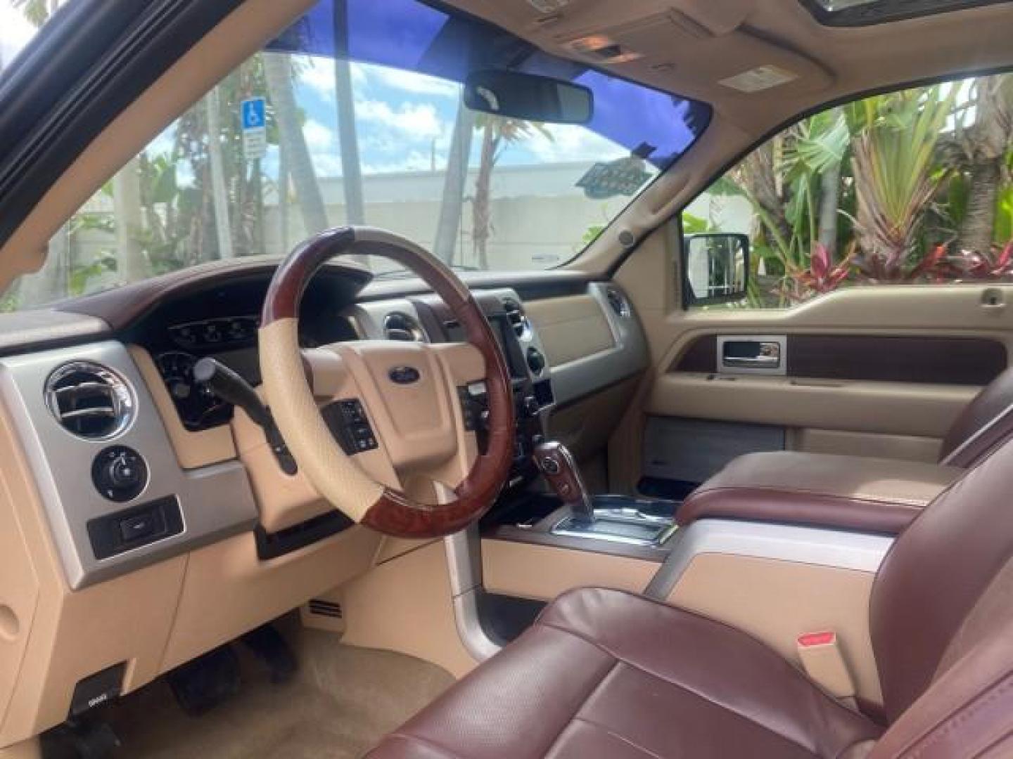 2013 Tuxedo Black Metallic /Chaparral w/Pale Adobe Interior Ford F-150 King Ranch LOW MILES 60,151 1 OWNER (1FTFW1CF6DK) with an 5.0L V8 FFV Engine engine, Automatic transmission, located at 4701 North Dixie Hwy, Pompano Beach, FL, 33064, (954) 422-2889, 26.240938, -80.123474 - OUR WEBPAGE FLORIDACARS1.COM HAS OVER 100 PHOTOS AND FREE CARFAX LINK 2013 FORD F-150 KING RANCH 1 OWNER FLORIDA SUNROOF LOADED VIN: 1FTFW1CF6DKF83375 1 F T F W 1 C F 6 D K F 8 3 3 7 5 CREW PICKUP 5.0L V8 F DOHC 32V FLEX FUEL 21 MPG REAR WHEEL DRIVE Features A/C Seat(s) ABS Brakes Air Conditioning A - Photo#49