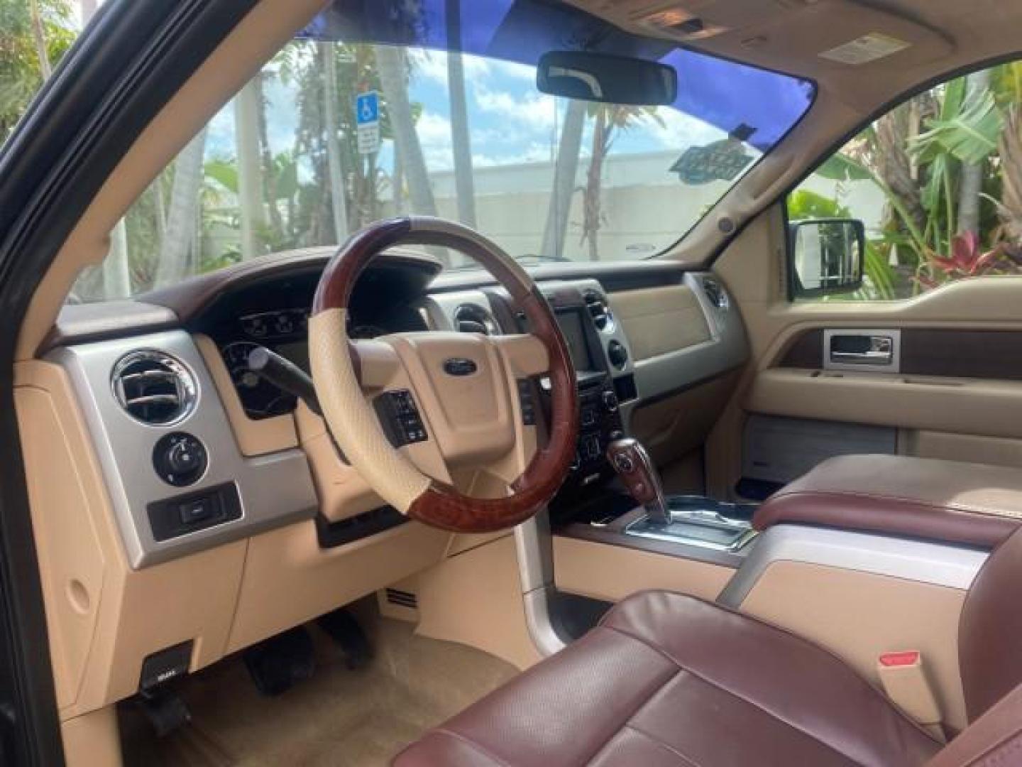 2013 Tuxedo Black Metallic /Chaparral w/Pale Adobe Interior Ford F-150 King Ranch LOW MILES 60,151 1 OWNER (1FTFW1CF6DK) with an 5.0L V8 FFV Engine engine, Automatic transmission, located at 4701 North Dixie Hwy, Pompano Beach, FL, 33064, (954) 422-2889, 26.240938, -80.123474 - OUR WEBPAGE FLORIDACARS1.COM HAS OVER 100 PHOTOS AND FREE CARFAX LINK 2013 FORD F-150 KING RANCH 1 OWNER FLORIDA SUNROOF LOADED VIN: 1FTFW1CF6DKF83375 1 F T F W 1 C F 6 D K F 8 3 3 7 5 CREW PICKUP 5.0L V8 F DOHC 32V FLEX FUEL 21 MPG REAR WHEEL DRIVE Features A/C Seat(s) ABS Brakes Air Conditioning A - Photo#50