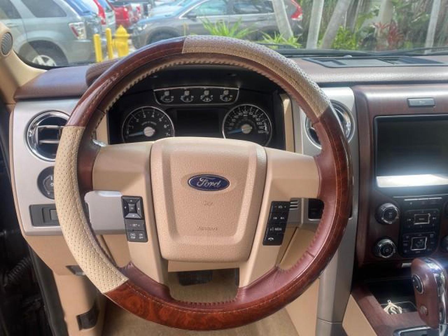 2013 Tuxedo Black Metallic /Chaparral w/Pale Adobe Interior Ford F-150 King Ranch LOW MILES 60,151 1 OWNER (1FTFW1CF6DK) with an 5.0L V8 FFV Engine engine, Automatic transmission, located at 4701 North Dixie Hwy, Pompano Beach, FL, 33064, (954) 422-2889, 26.240938, -80.123474 - OUR WEBPAGE FLORIDACARS1.COM HAS OVER 100 PHOTOS AND FREE CARFAX LINK 2013 FORD F-150 KING RANCH 1 OWNER FLORIDA SUNROOF LOADED VIN: 1FTFW1CF6DKF83375 1 F T F W 1 C F 6 D K F 8 3 3 7 5 CREW PICKUP 5.0L V8 F DOHC 32V FLEX FUEL 21 MPG REAR WHEEL DRIVE Features A/C Seat(s) ABS Brakes Air Conditioning A - Photo#51