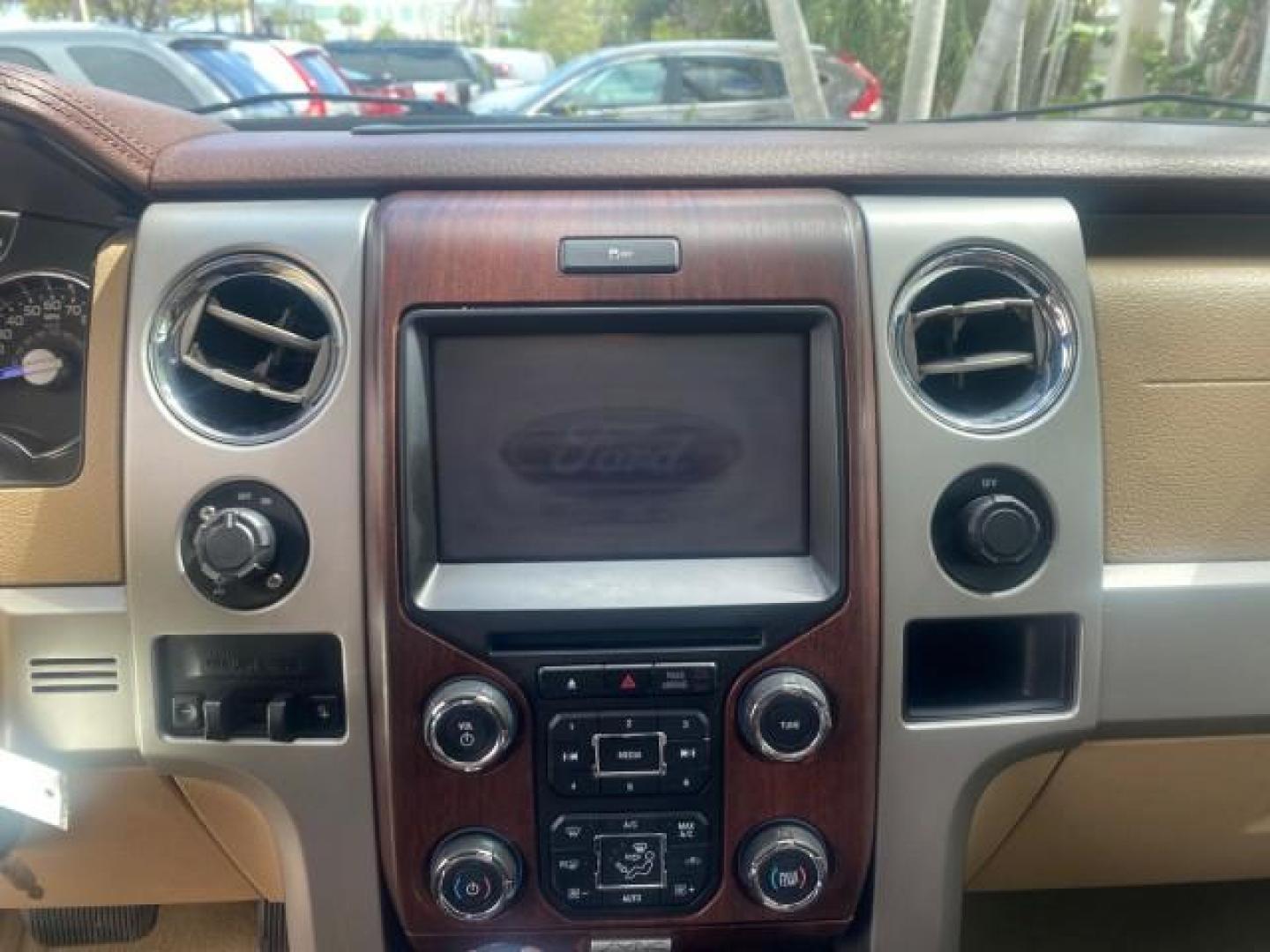 2013 Tuxedo Black Metallic /Chaparral w/Pale Adobe Interior Ford F-150 King Ranch LOW MILES 60,151 1 OWNER (1FTFW1CF6DK) with an 5.0L V8 FFV Engine engine, Automatic transmission, located at 4701 North Dixie Hwy, Pompano Beach, FL, 33064, (954) 422-2889, 26.240938, -80.123474 - OUR WEBPAGE FLORIDACARS1.COM HAS OVER 100 PHOTOS AND FREE CARFAX LINK 2013 FORD F-150 KING RANCH 1 OWNER FLORIDA SUNROOF LOADED VIN: 1FTFW1CF6DKF83375 1 F T F W 1 C F 6 D K F 8 3 3 7 5 CREW PICKUP 5.0L V8 F DOHC 32V FLEX FUEL 21 MPG REAR WHEEL DRIVE Features A/C Seat(s) ABS Brakes Air Conditioning A - Photo#58