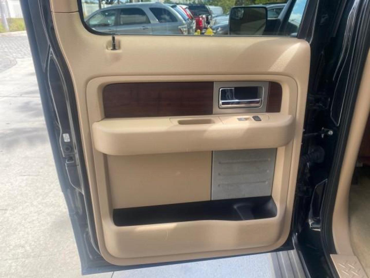 2013 Tuxedo Black Metallic /Chaparral w/Pale Adobe Interior Ford F-150 King Ranch LOW MILES 60,151 1 OWNER (1FTFW1CF6DK) with an 5.0L V8 FFV Engine engine, Automatic transmission, located at 4701 North Dixie Hwy, Pompano Beach, FL, 33064, (954) 422-2889, 26.240938, -80.123474 - OUR WEBPAGE FLORIDACARS1.COM HAS OVER 100 PHOTOS AND FREE CARFAX LINK 2013 FORD F-150 KING RANCH 1 OWNER FLORIDA SUNROOF LOADED VIN: 1FTFW1CF6DKF83375 1 F T F W 1 C F 6 D K F 8 3 3 7 5 CREW PICKUP 5.0L V8 F DOHC 32V FLEX FUEL 21 MPG REAR WHEEL DRIVE Features A/C Seat(s) ABS Brakes Air Conditioning A - Photo#79