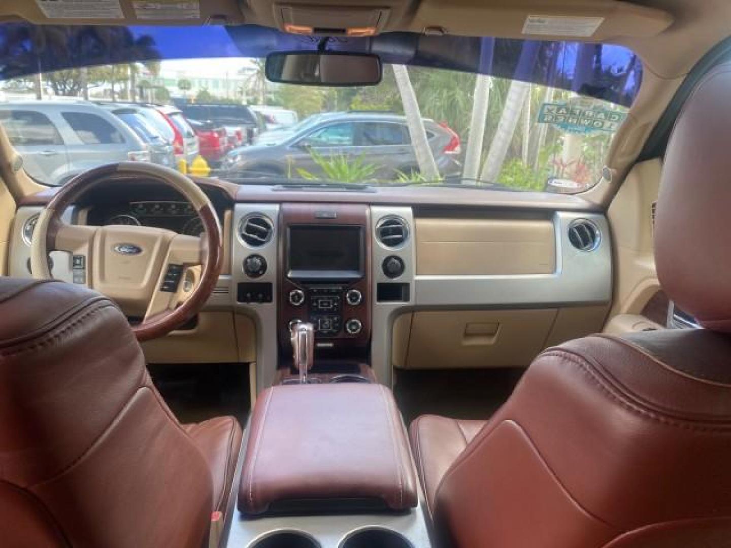 2013 Tuxedo Black Metallic /Chaparral w/Pale Adobe Interior Ford F-150 King Ranch LOW MILES 60,151 1 OWNER (1FTFW1CF6DK) with an 5.0L V8 FFV Engine engine, Automatic transmission, located at 4701 North Dixie Hwy, Pompano Beach, FL, 33064, (954) 422-2889, 26.240938, -80.123474 - OUR WEBPAGE FLORIDACARS1.COM HAS OVER 100 PHOTOS AND FREE CARFAX LINK 2013 FORD F-150 KING RANCH 1 OWNER FLORIDA SUNROOF LOADED VIN: 1FTFW1CF6DKF83375 1 F T F W 1 C F 6 D K F 8 3 3 7 5 CREW PICKUP 5.0L V8 F DOHC 32V FLEX FUEL 21 MPG REAR WHEEL DRIVE Features A/C Seat(s) ABS Brakes Air Conditioning A - Photo#87