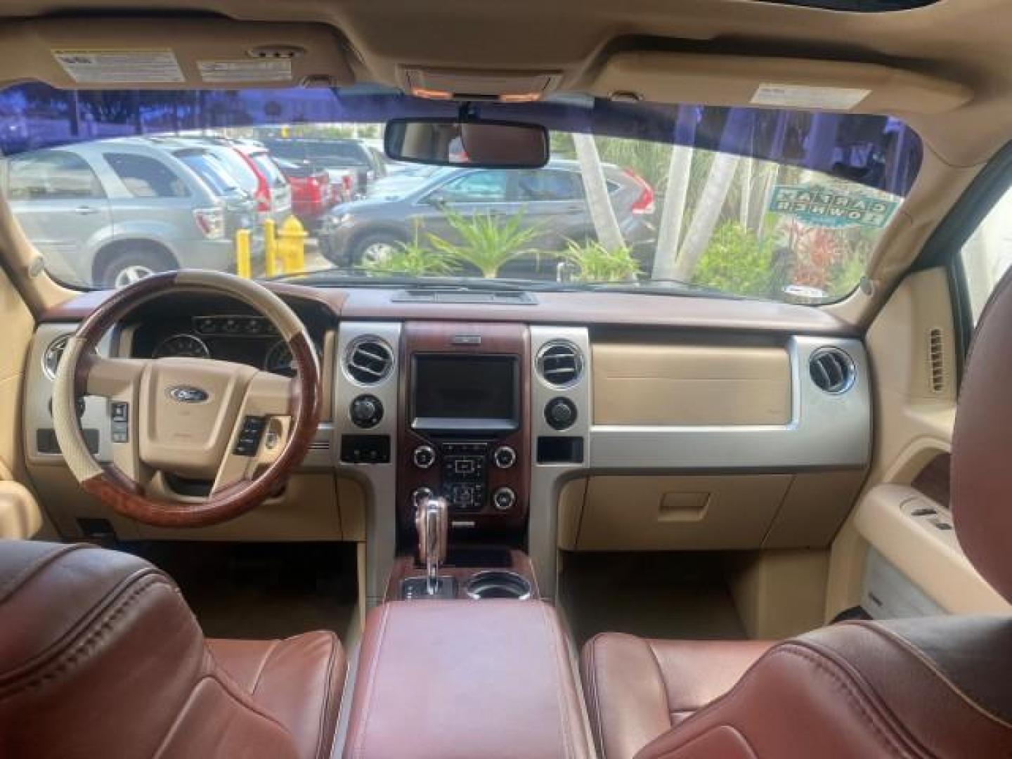 2013 Tuxedo Black Metallic /Chaparral w/Pale Adobe Interior Ford F-150 King Ranch LOW MILES 60,151 1 OWNER (1FTFW1CF6DK) with an 5.0L V8 FFV Engine engine, Automatic transmission, located at 4701 North Dixie Hwy, Pompano Beach, FL, 33064, (954) 422-2889, 26.240938, -80.123474 - OUR WEBPAGE FLORIDACARS1.COM HAS OVER 100 PHOTOS AND FREE CARFAX LINK 2013 FORD F-150 KING RANCH 1 OWNER FLORIDA SUNROOF LOADED VIN: 1FTFW1CF6DKF83375 1 F T F W 1 C F 6 D K F 8 3 3 7 5 CREW PICKUP 5.0L V8 F DOHC 32V FLEX FUEL 21 MPG REAR WHEEL DRIVE Features A/C Seat(s) ABS Brakes Air Conditioning A - Photo#88