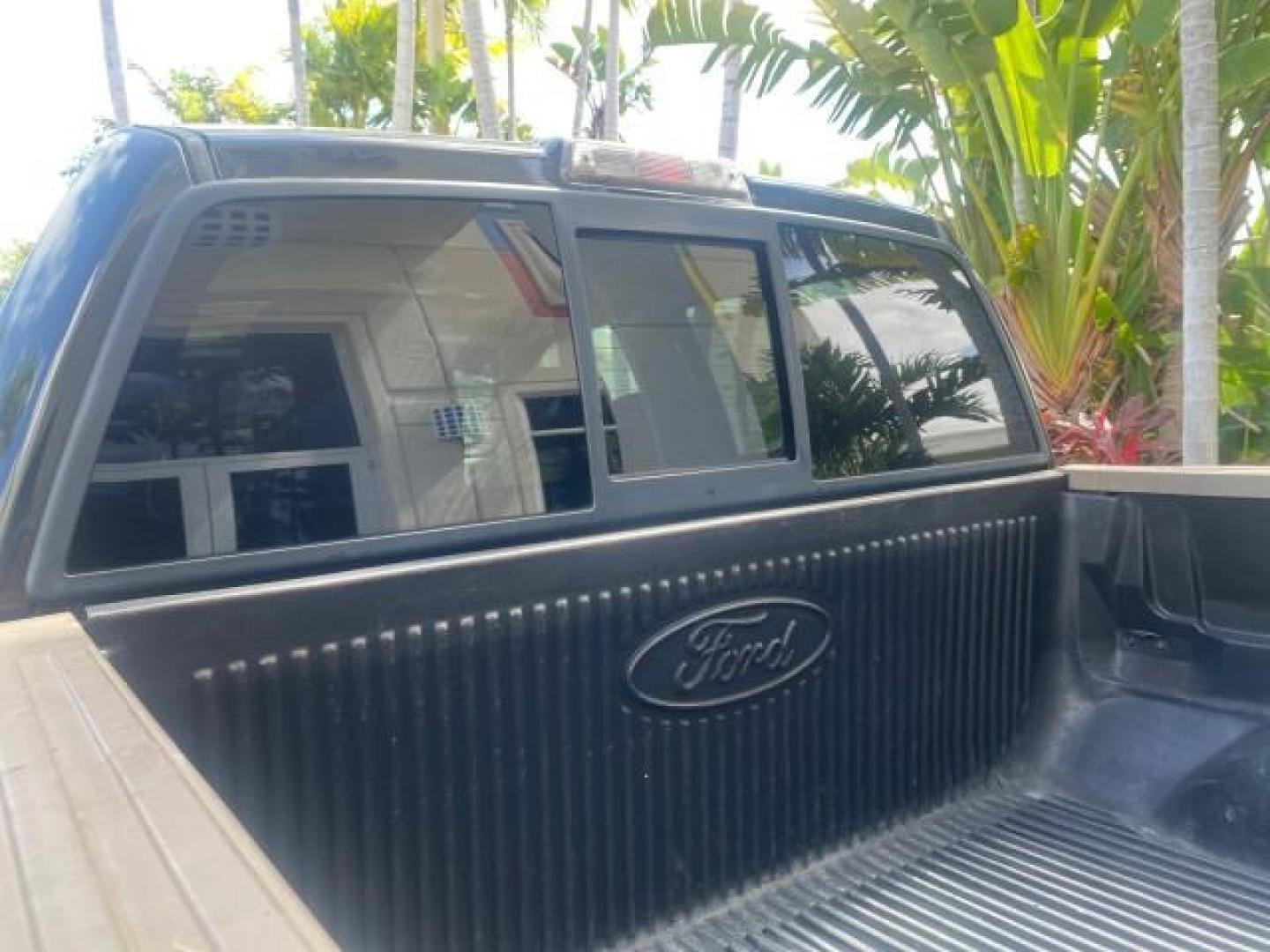 2013 Tuxedo Black Metallic /Chaparral w/Pale Adobe Interior Ford F-150 King Ranch LOW MILES 60,151 1 OWNER (1FTFW1CF6DK) with an 5.0L V8 FFV Engine engine, Automatic transmission, located at 4701 North Dixie Hwy, Pompano Beach, FL, 33064, (954) 422-2889, 26.240938, -80.123474 - OUR WEBPAGE FLORIDACARS1.COM HAS OVER 100 PHOTOS AND FREE CARFAX LINK 2013 FORD F-150 KING RANCH 1 OWNER FLORIDA SUNROOF LOADED VIN: 1FTFW1CF6DKF83375 1 F T F W 1 C F 6 D K F 8 3 3 7 5 CREW PICKUP 5.0L V8 F DOHC 32V FLEX FUEL 21 MPG REAR WHEEL DRIVE Features A/C Seat(s) ABS Brakes Air Conditioning A - Photo#99