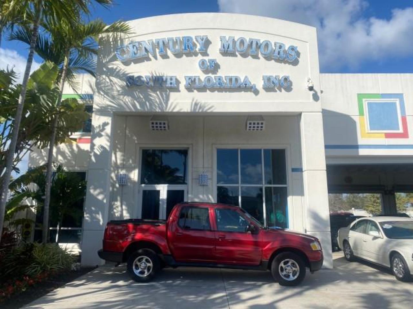 2005 Bright Red /Medium Dark Flint Ford Explorer Sport Trac PU XLS LOW MILES 72,457 (1FMZU67K85U) with an 4.0L SOHC V6 Engine engine, Automatic transmission, located at 4701 North Dixie Hwy, Pompano Beach, FL, 33064, (954) 422-2889, 26.240938, -80.123474 - OUR WEBPAGE FLORIDACARS1.COM HAS OVER 100 PHOTOS AND FREE CARFAX LINK 2005 FORD EXPLORER SPORT TRAC XLS PICKUP VIN: 1FMZU67K85UB51993 1 F M Z U 6 7 K 8 5 U B 5 1 9 9 3 SPORT PICKUP 4.0L V6 F FLEX FUEL 21 MPG REAR WHEEL DRIVE Features ABS Brakes Air Conditioning Alloy Wheels AM/FM Stereo Automatic Tr - Photo#0