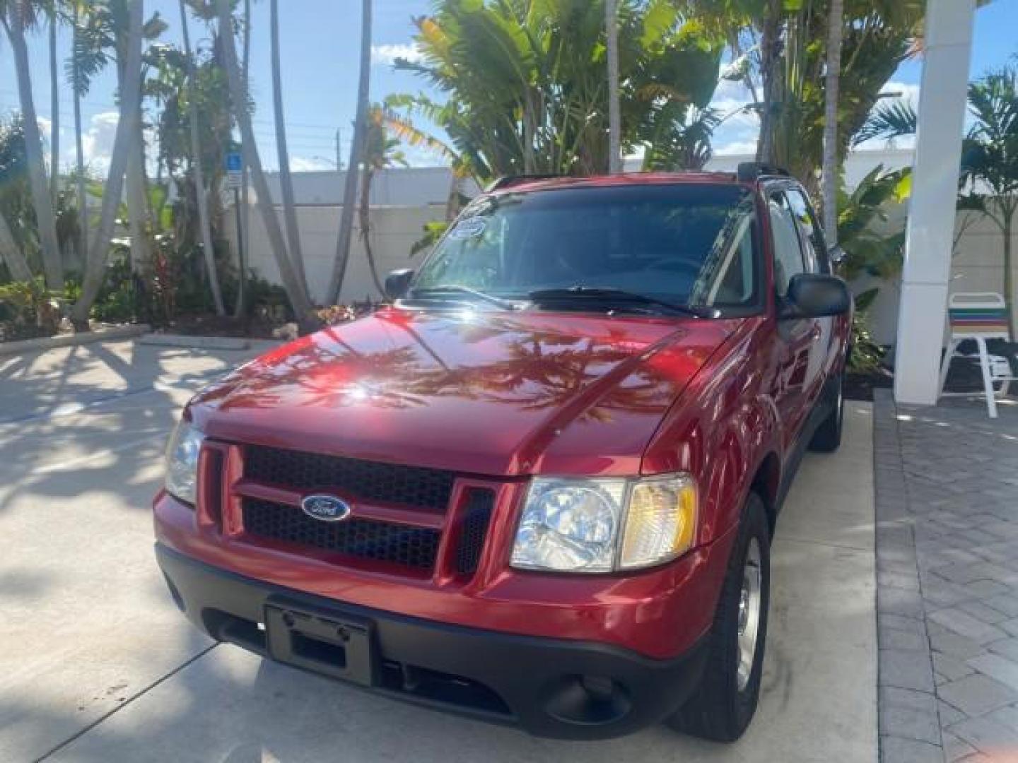 2005 Bright Red /Medium Dark Flint Ford Explorer Sport Trac PU XLS LOW MILES 72,457 (1FMZU67K85U) with an 4.0L SOHC V6 Engine engine, Automatic transmission, located at 4701 North Dixie Hwy, Pompano Beach, FL, 33064, (954) 422-2889, 26.240938, -80.123474 - OUR WEBPAGE FLORIDACARS1.COM HAS OVER 100 PHOTOS AND FREE CARFAX LINK 2005 FORD EXPLORER SPORT TRAC XLS PICKUP VIN: 1FMZU67K85UB51993 1 F M Z U 6 7 K 8 5 U B 5 1 9 9 3 SPORT PICKUP 4.0L V6 F FLEX FUEL 21 MPG REAR WHEEL DRIVE Features ABS Brakes Air Conditioning Alloy Wheels AM/FM Stereo Automatic Tr - Photo#3