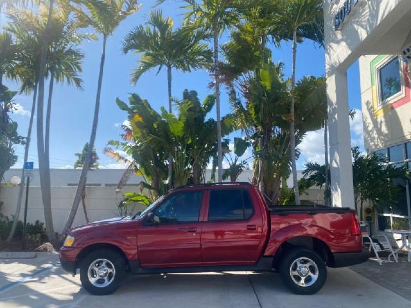 2005 Bright Red /Medium Dark Flint Ford Explorer Sport Trac PU XLS LOW MILES 72,457 (1FMZU67K85U) with an 4.0L SOHC V6 Engine engine, Automatic transmission, located at 4701 North Dixie Hwy, Pompano Beach, FL, 33064, (954) 422-2889, 26.240938, -80.123474 - OUR WEBPAGE FLORIDACARS1.COM HAS OVER 100 PHOTOS AND FREE CARFAX LINK 2005 FORD EXPLORER SPORT TRAC XLS PICKUP VIN: 1FMZU67K85UB51993 1 F M Z U 6 7 K 8 5 U B 5 1 9 9 3 SPORT PICKUP 4.0L V6 F FLEX FUEL 21 MPG REAR WHEEL DRIVE Features ABS Brakes Air Conditioning Alloy Wheels AM/FM Stereo Automatic Tr - Photo#4