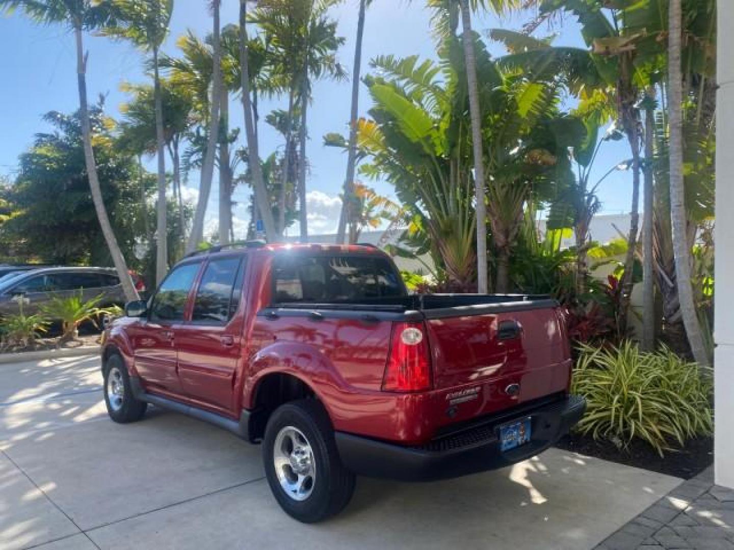 2005 Bright Red /Medium Dark Flint Ford Explorer Sport Trac PU XLS LOW MILES 72,457 (1FMZU67K85U) with an 4.0L SOHC V6 Engine engine, Automatic transmission, located at 4701 North Dixie Hwy, Pompano Beach, FL, 33064, (954) 422-2889, 26.240938, -80.123474 - OUR WEBPAGE FLORIDACARS1.COM HAS OVER 100 PHOTOS AND FREE CARFAX LINK 2005 FORD EXPLORER SPORT TRAC XLS PICKUP VIN: 1FMZU67K85UB51993 1 F M Z U 6 7 K 8 5 U B 5 1 9 9 3 SPORT PICKUP 4.0L V6 F FLEX FUEL 21 MPG REAR WHEEL DRIVE Features ABS Brakes Air Conditioning Alloy Wheels AM/FM Stereo Automatic Tr - Photo#5