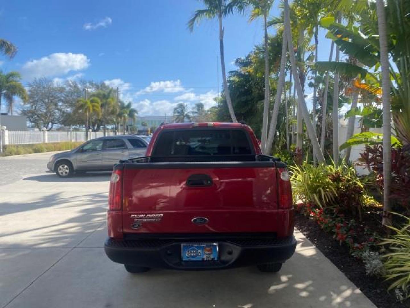 2005 Bright Red /Medium Dark Flint Ford Explorer Sport Trac PU XLS LOW MILES 72,457 (1FMZU67K85U) with an 4.0L SOHC V6 Engine engine, Automatic transmission, located at 4701 North Dixie Hwy, Pompano Beach, FL, 33064, (954) 422-2889, 26.240938, -80.123474 - OUR WEBPAGE FLORIDACARS1.COM HAS OVER 100 PHOTOS AND FREE CARFAX LINK 2005 FORD EXPLORER SPORT TRAC XLS PICKUP VIN: 1FMZU67K85UB51993 1 F M Z U 6 7 K 8 5 U B 5 1 9 9 3 SPORT PICKUP 4.0L V6 F FLEX FUEL 21 MPG REAR WHEEL DRIVE Features ABS Brakes Air Conditioning Alloy Wheels AM/FM Stereo Automatic Tr - Photo#6
