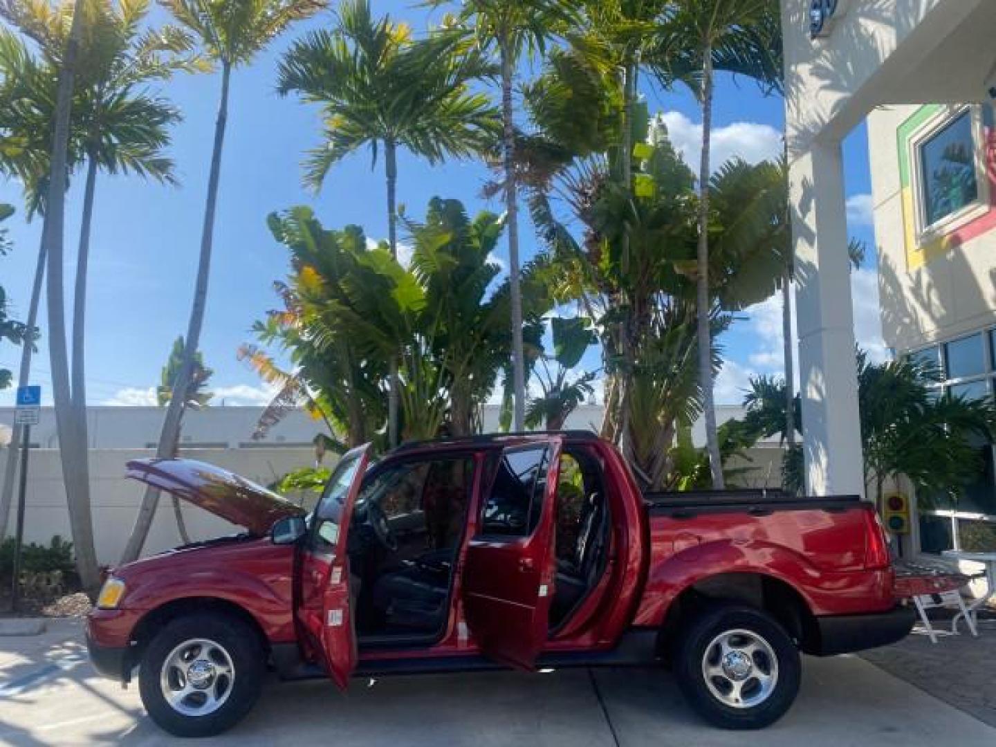 2005 Bright Red /Medium Dark Flint Ford Explorer Sport Trac PU XLS LOW MILES 72,457 (1FMZU67K85U) with an 4.0L SOHC V6 Engine engine, Automatic transmission, located at 4701 North Dixie Hwy, Pompano Beach, FL, 33064, (954) 422-2889, 26.240938, -80.123474 - OUR WEBPAGE FLORIDACARS1.COM HAS OVER 100 PHOTOS AND FREE CARFAX LINK 2005 FORD EXPLORER SPORT TRAC XLS PICKUP VIN: 1FMZU67K85UB51993 1 F M Z U 6 7 K 8 5 U B 5 1 9 9 3 SPORT PICKUP 4.0L V6 F FLEX FUEL 21 MPG REAR WHEEL DRIVE Features ABS Brakes Air Conditioning Alloy Wheels AM/FM Stereo Automatic Tr - Photo#8