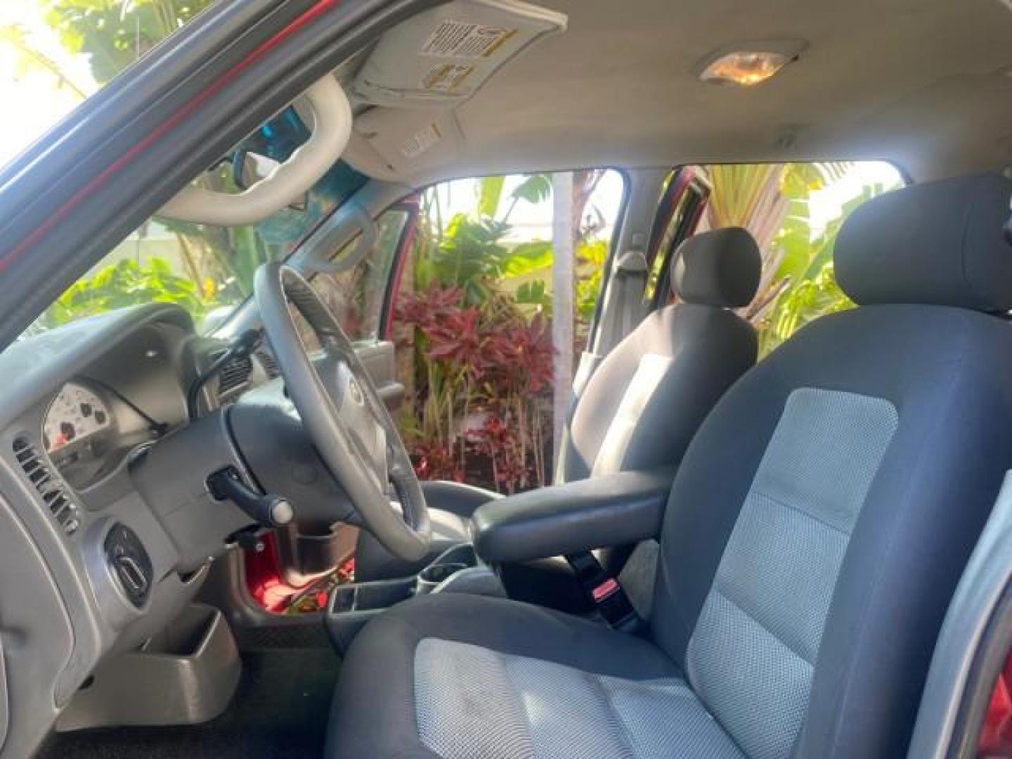 2005 Bright Red /Medium Dark Flint Ford Explorer Sport Trac PU XLS LOW MILES 72,457 (1FMZU67K85U) with an 4.0L SOHC V6 Engine engine, Automatic transmission, located at 4701 North Dixie Hwy, Pompano Beach, FL, 33064, (954) 422-2889, 26.240938, -80.123474 - OUR WEBPAGE FLORIDACARS1.COM HAS OVER 100 PHOTOS AND FREE CARFAX LINK 2005 FORD EXPLORER SPORT TRAC XLS PICKUP VIN: 1FMZU67K85UB51993 1 F M Z U 6 7 K 8 5 U B 5 1 9 9 3 SPORT PICKUP 4.0L V6 F FLEX FUEL 21 MPG REAR WHEEL DRIVE Features ABS Brakes Air Conditioning Alloy Wheels AM/FM Stereo Automatic Tr - Photo#10
