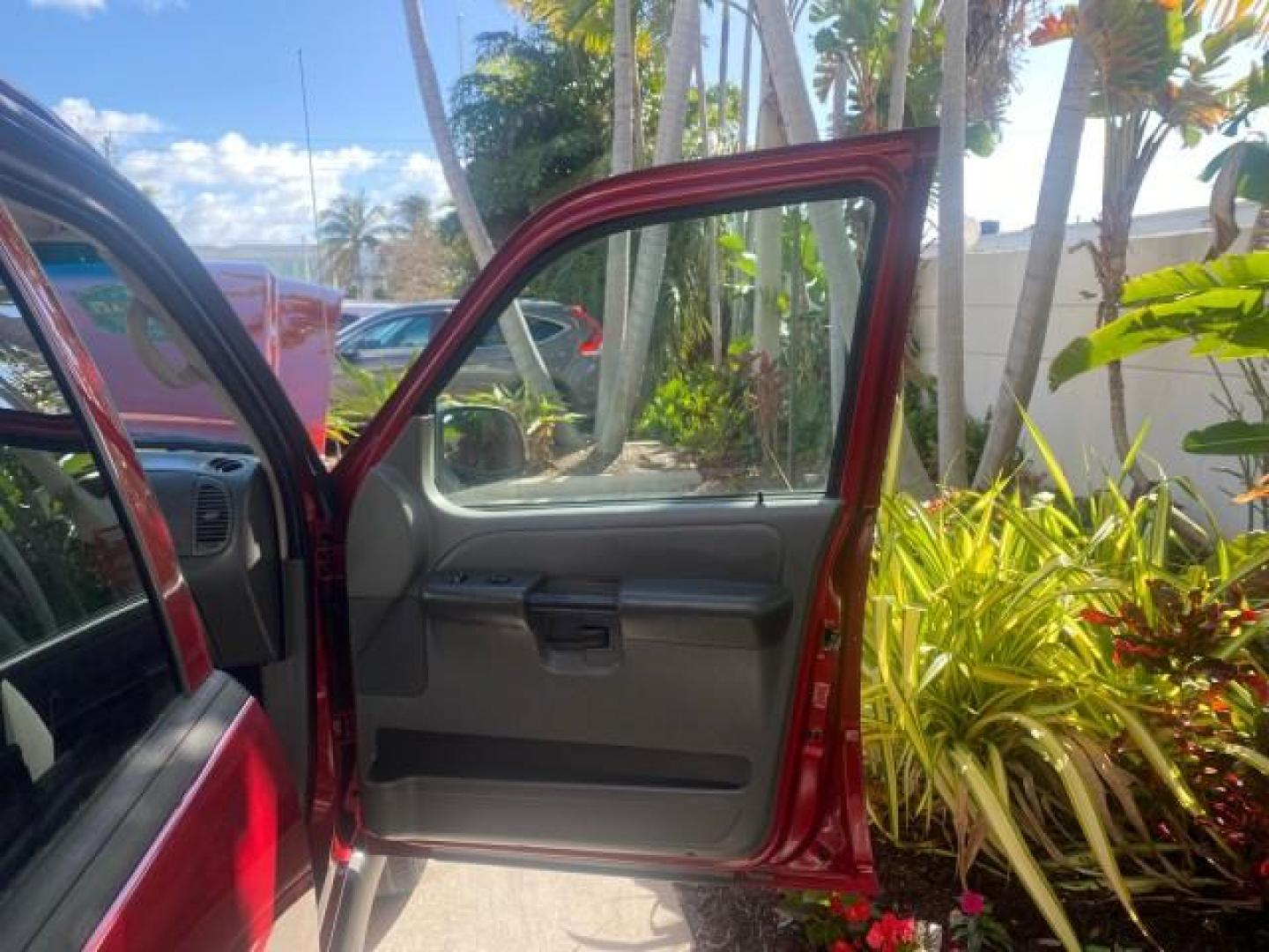 2005 Bright Red /Medium Dark Flint Ford Explorer Sport Trac PU XLS LOW MILES 72,457 (1FMZU67K85U) with an 4.0L SOHC V6 Engine engine, Automatic transmission, located at 4701 North Dixie Hwy, Pompano Beach, FL, 33064, (954) 422-2889, 26.240938, -80.123474 - OUR WEBPAGE FLORIDACARS1.COM HAS OVER 100 PHOTOS AND FREE CARFAX LINK 2005 FORD EXPLORER SPORT TRAC XLS PICKUP VIN: 1FMZU67K85UB51993 1 F M Z U 6 7 K 8 5 U B 5 1 9 9 3 SPORT PICKUP 4.0L V6 F FLEX FUEL 21 MPG REAR WHEEL DRIVE Features ABS Brakes Air Conditioning Alloy Wheels AM/FM Stereo Automatic Tr - Photo#11