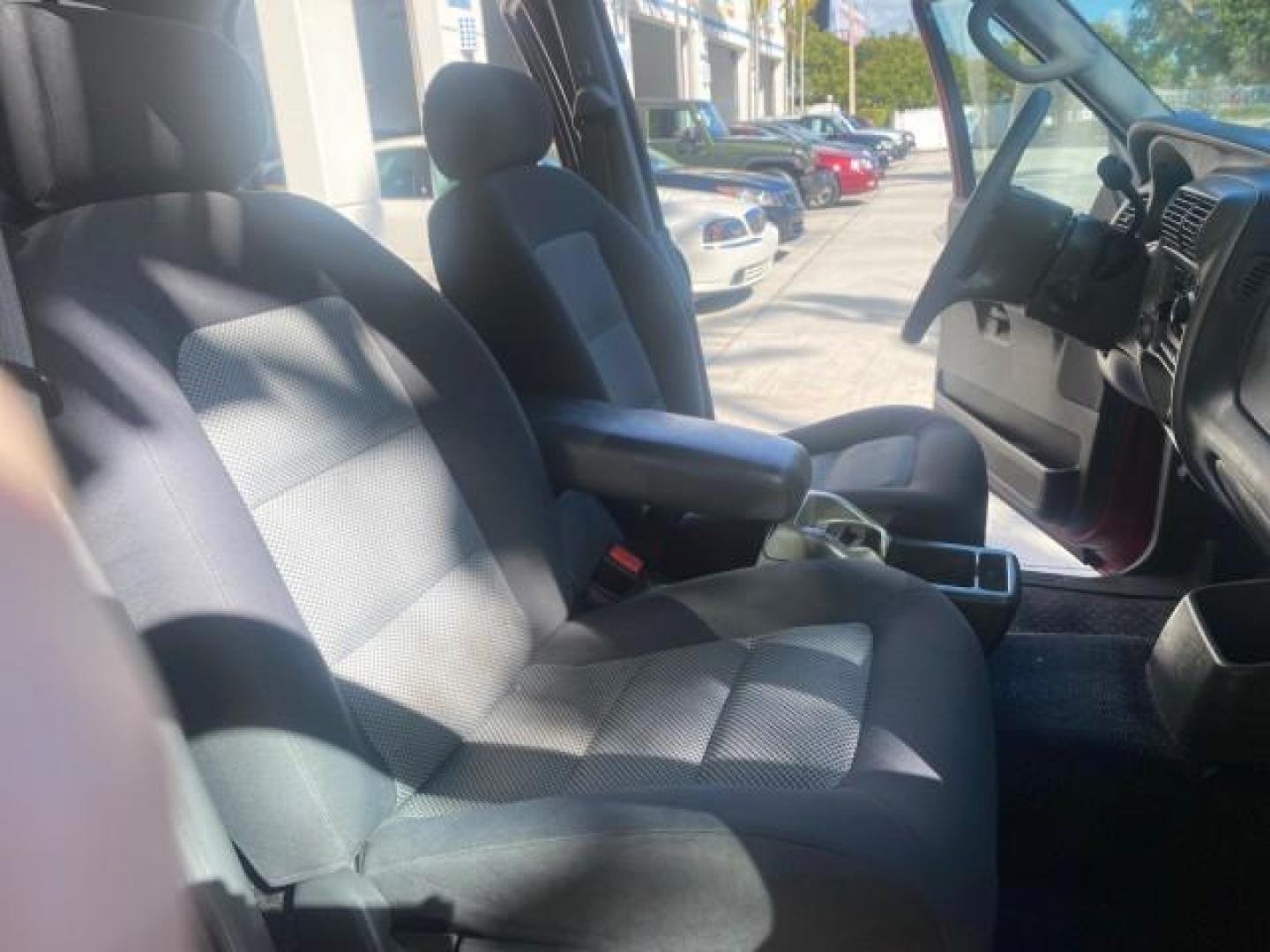 2005 Bright Red /Medium Dark Flint Ford Explorer Sport Trac PU XLS LOW MILES 72,457 (1FMZU67K85U) with an 4.0L SOHC V6 Engine engine, Automatic transmission, located at 4701 North Dixie Hwy, Pompano Beach, FL, 33064, (954) 422-2889, 26.240938, -80.123474 - OUR WEBPAGE FLORIDACARS1.COM HAS OVER 100 PHOTOS AND FREE CARFAX LINK 2005 FORD EXPLORER SPORT TRAC XLS PICKUP VIN: 1FMZU67K85UB51993 1 F M Z U 6 7 K 8 5 U B 5 1 9 9 3 SPORT PICKUP 4.0L V6 F FLEX FUEL 21 MPG REAR WHEEL DRIVE Features ABS Brakes Air Conditioning Alloy Wheels AM/FM Stereo Automatic Tr - Photo#12