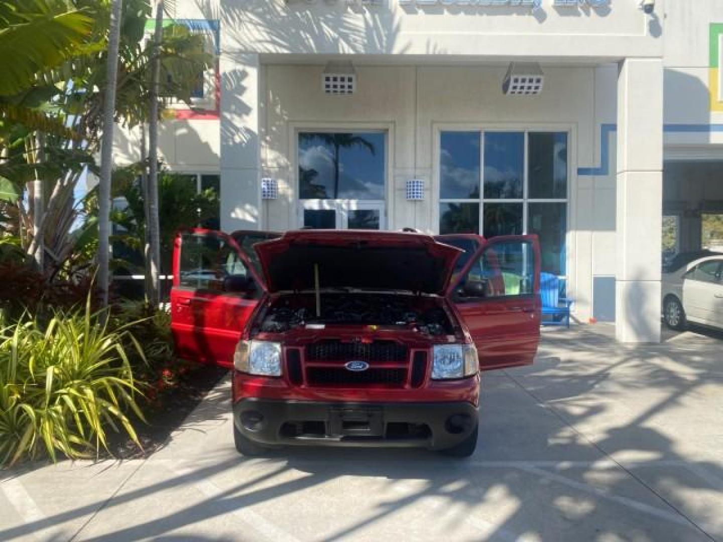 2005 Bright Red /Medium Dark Flint Ford Explorer Sport Trac PU XLS LOW MILES 72,457 (1FMZU67K85U) with an 4.0L SOHC V6 Engine engine, Automatic transmission, located at 4701 North Dixie Hwy, Pompano Beach, FL, 33064, (954) 422-2889, 26.240938, -80.123474 - OUR WEBPAGE FLORIDACARS1.COM HAS OVER 100 PHOTOS AND FREE CARFAX LINK 2005 FORD EXPLORER SPORT TRAC XLS PICKUP VIN: 1FMZU67K85UB51993 1 F M Z U 6 7 K 8 5 U B 5 1 9 9 3 SPORT PICKUP 4.0L V6 F FLEX FUEL 21 MPG REAR WHEEL DRIVE Features ABS Brakes Air Conditioning Alloy Wheels AM/FM Stereo Automatic Tr - Photo#16