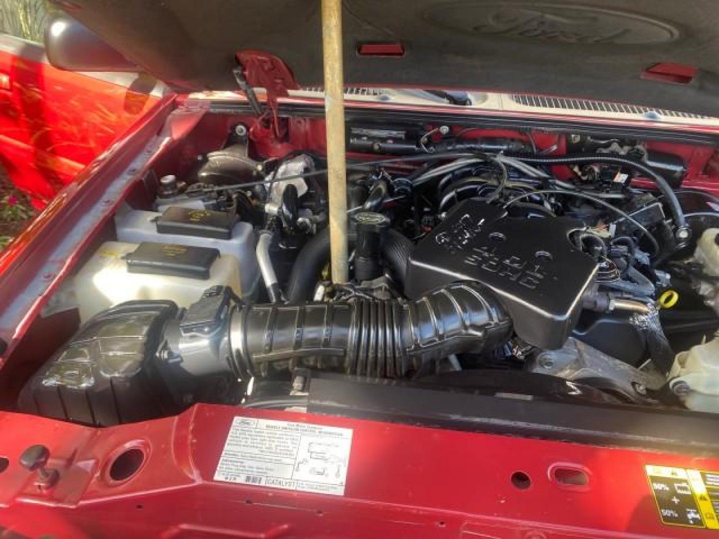 2005 Bright Red /Medium Dark Flint Ford Explorer Sport Trac PU XLS LOW MILES 72,457 (1FMZU67K85U) with an 4.0L SOHC V6 Engine engine, Automatic transmission, located at 4701 North Dixie Hwy, Pompano Beach, FL, 33064, (954) 422-2889, 26.240938, -80.123474 - OUR WEBPAGE FLORIDACARS1.COM HAS OVER 100 PHOTOS AND FREE CARFAX LINK 2005 FORD EXPLORER SPORT TRAC XLS PICKUP VIN: 1FMZU67K85UB51993 1 F M Z U 6 7 K 8 5 U B 5 1 9 9 3 SPORT PICKUP 4.0L V6 F FLEX FUEL 21 MPG REAR WHEEL DRIVE Features ABS Brakes Air Conditioning Alloy Wheels AM/FM Stereo Automatic Tr - Photo#24