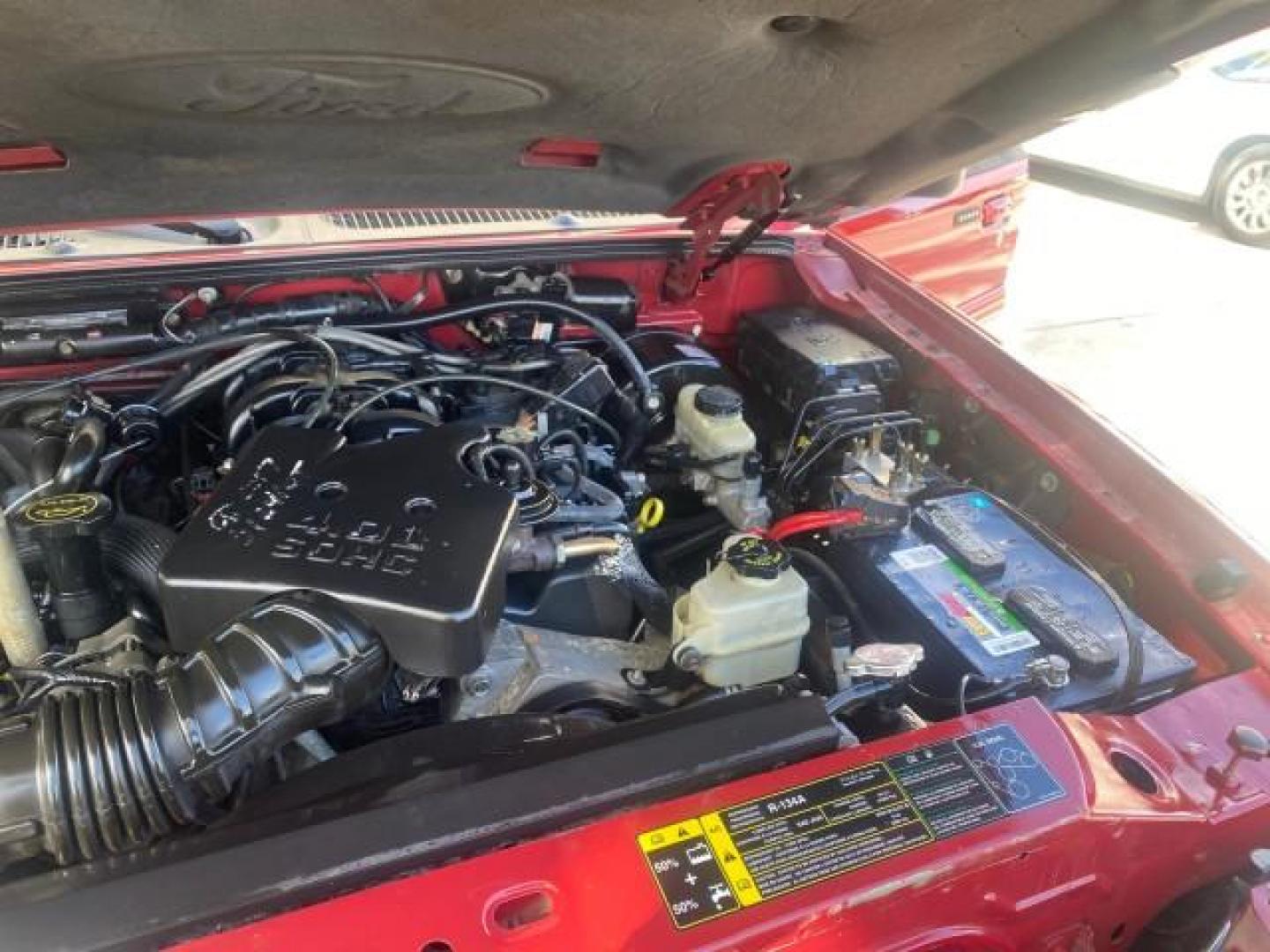 2005 Bright Red /Medium Dark Flint Ford Explorer Sport Trac PU XLS LOW MILES 72,457 (1FMZU67K85U) with an 4.0L SOHC V6 Engine engine, Automatic transmission, located at 4701 North Dixie Hwy, Pompano Beach, FL, 33064, (954) 422-2889, 26.240938, -80.123474 - OUR WEBPAGE FLORIDACARS1.COM HAS OVER 100 PHOTOS AND FREE CARFAX LINK 2005 FORD EXPLORER SPORT TRAC XLS PICKUP VIN: 1FMZU67K85UB51993 1 F M Z U 6 7 K 8 5 U B 5 1 9 9 3 SPORT PICKUP 4.0L V6 F FLEX FUEL 21 MPG REAR WHEEL DRIVE Features ABS Brakes Air Conditioning Alloy Wheels AM/FM Stereo Automatic Tr - Photo#25