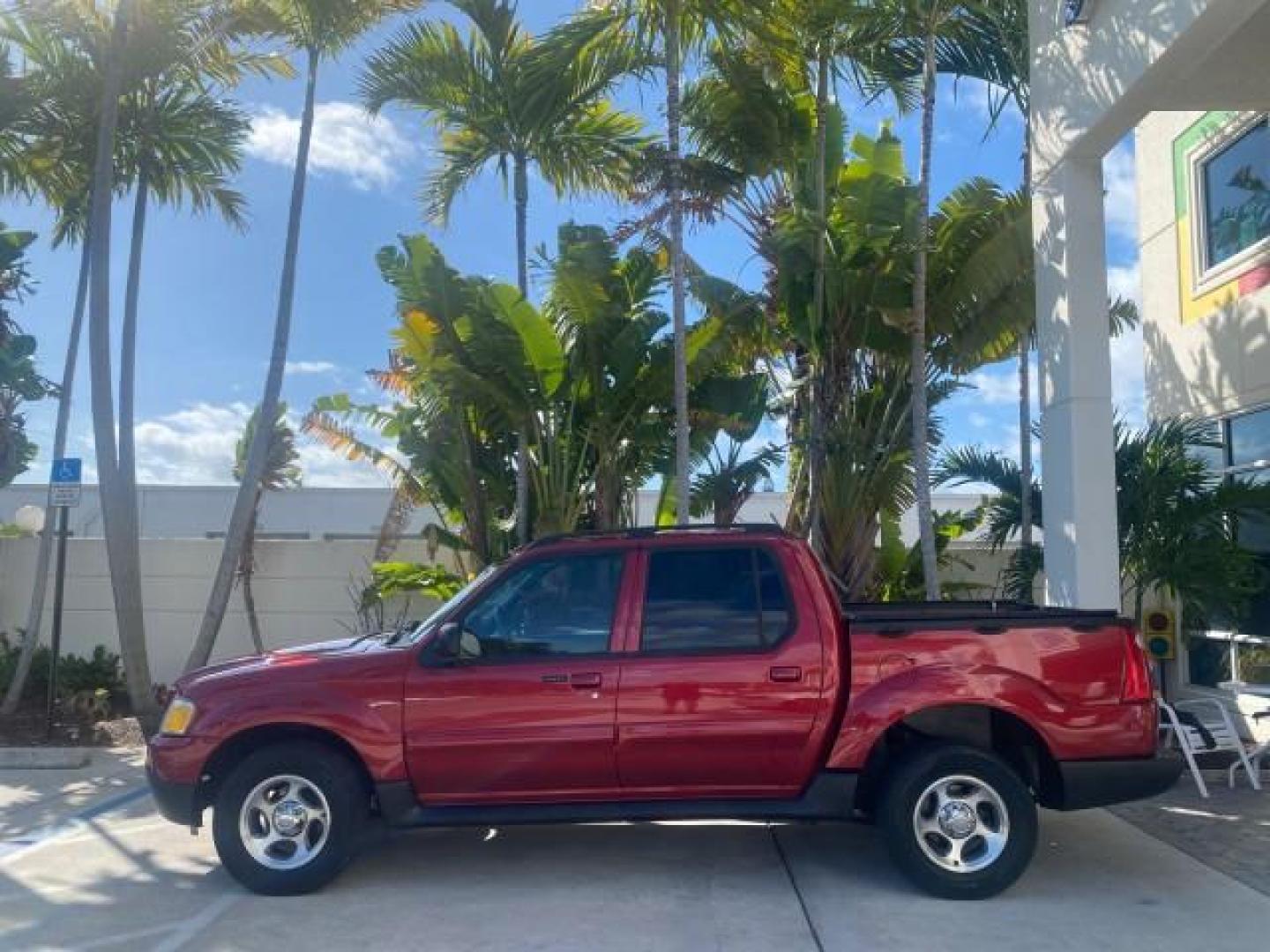 2005 Bright Red /Medium Dark Flint Ford Explorer Sport Trac PU XLS LOW MILES 72,457 (1FMZU67K85U) with an 4.0L SOHC V6 Engine engine, Automatic transmission, located at 4701 North Dixie Hwy, Pompano Beach, FL, 33064, (954) 422-2889, 26.240938, -80.123474 - OUR WEBPAGE FLORIDACARS1.COM HAS OVER 100 PHOTOS AND FREE CARFAX LINK 2005 FORD EXPLORER SPORT TRAC XLS PICKUP VIN: 1FMZU67K85UB51993 1 F M Z U 6 7 K 8 5 U B 5 1 9 9 3 SPORT PICKUP 4.0L V6 F FLEX FUEL 21 MPG REAR WHEEL DRIVE Features ABS Brakes Air Conditioning Alloy Wheels AM/FM Stereo Automatic Tr - Photo#30