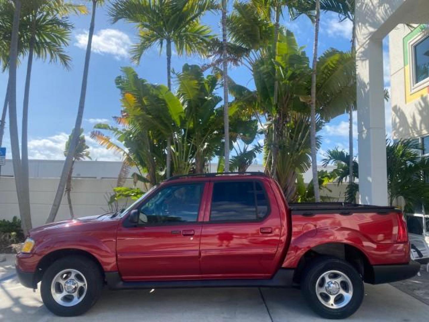 2005 Bright Red /Medium Dark Flint Ford Explorer Sport Trac PU XLS LOW MILES 72,457 (1FMZU67K85U) with an 4.0L SOHC V6 Engine engine, Automatic transmission, located at 4701 North Dixie Hwy, Pompano Beach, FL, 33064, (954) 422-2889, 26.240938, -80.123474 - OUR WEBPAGE FLORIDACARS1.COM HAS OVER 100 PHOTOS AND FREE CARFAX LINK 2005 FORD EXPLORER SPORT TRAC XLS PICKUP VIN: 1FMZU67K85UB51993 1 F M Z U 6 7 K 8 5 U B 5 1 9 9 3 SPORT PICKUP 4.0L V6 F FLEX FUEL 21 MPG REAR WHEEL DRIVE Features ABS Brakes Air Conditioning Alloy Wheels AM/FM Stereo Automatic Tr - Photo#31