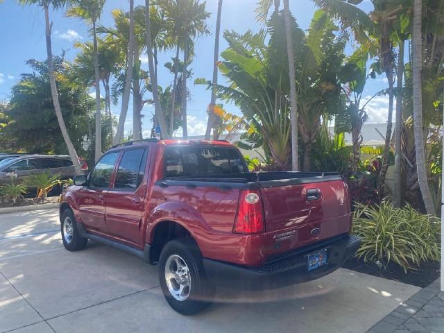 2005 Bright Red /Medium Dark Flint Ford Explorer Sport Trac PU XLS LOW MILES 72,457 (1FMZU67K85U) with an 4.0L SOHC V6 Engine engine, Automatic transmission, located at 4701 North Dixie Hwy, Pompano Beach, FL, 33064, (954) 422-2889, 26.240938, -80.123474 - OUR WEBPAGE FLORIDACARS1.COM HAS OVER 100 PHOTOS AND FREE CARFAX LINK 2005 FORD EXPLORER SPORT TRAC XLS PICKUP VIN: 1FMZU67K85UB51993 1 F M Z U 6 7 K 8 5 U B 5 1 9 9 3 SPORT PICKUP 4.0L V6 F FLEX FUEL 21 MPG REAR WHEEL DRIVE Features ABS Brakes Air Conditioning Alloy Wheels AM/FM Stereo Automatic Tr - Photo#32